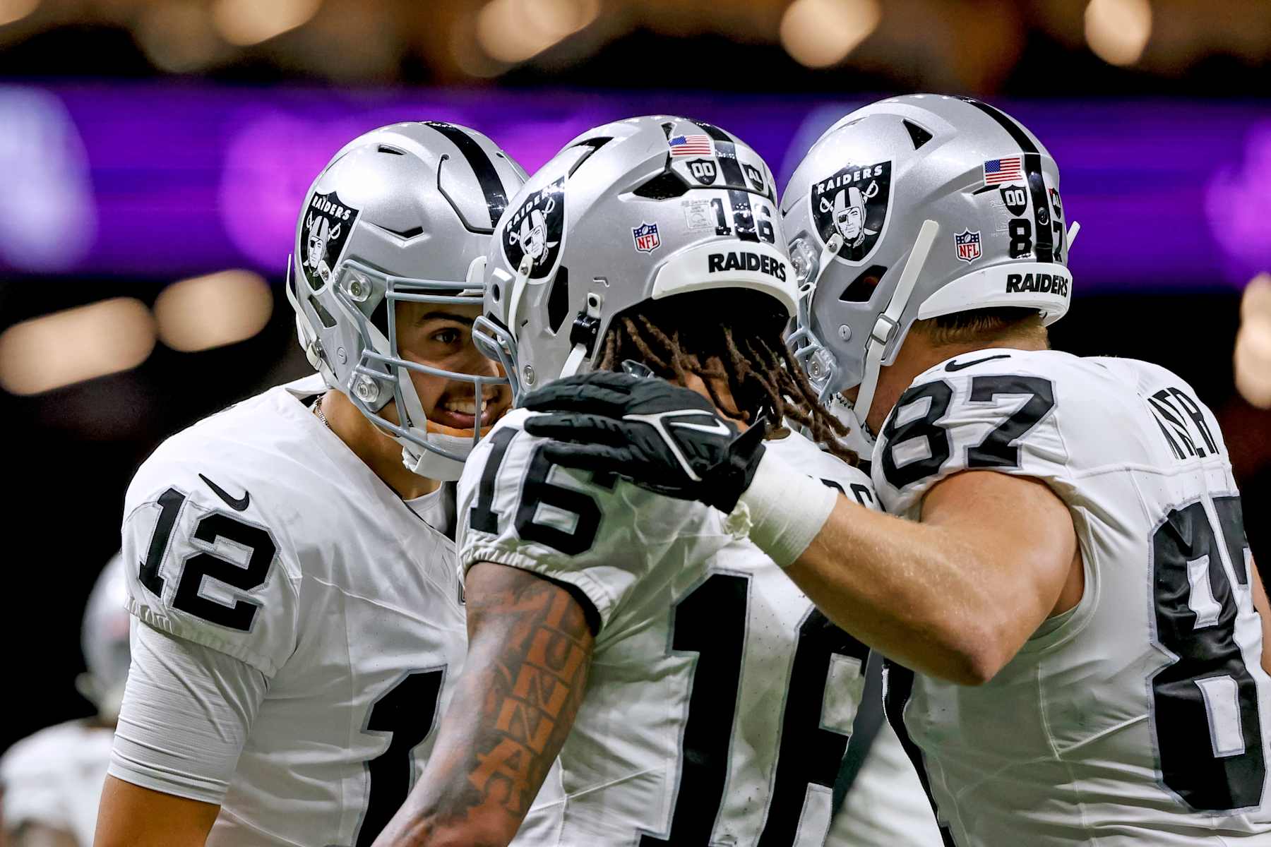 NEW ORLEANS, LOUISIANA - DECEMBER 29: Aidan O'Connell #12 of the Las Vegas Raiders celebrates with Jakobi Meyers #16 after a touchdown during the first half of a game against the New Orleans Saints at the Caesars Superdome on December 29, 2024 in New Orleans, Louisiana. (Photo by Derick E. Hingle/Getty Images)
