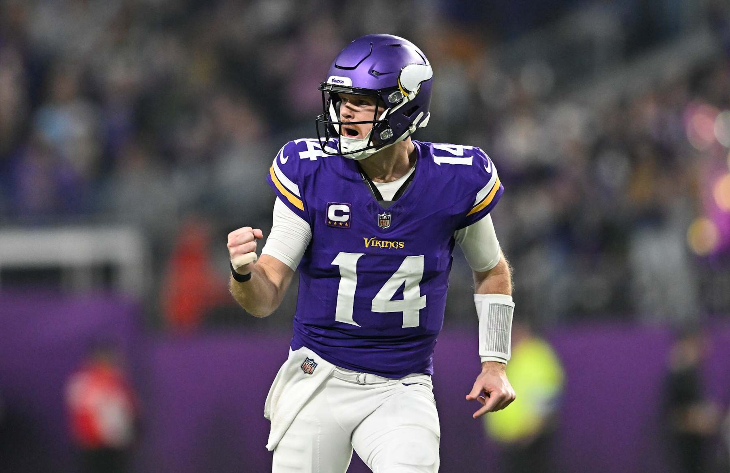 MINNEAPOLIS, MINNESOTA - DECEMBER 29: Quarterback Sam Darnold #14 of the Minnesota Vikings reacts after a throwing a touchdown pass during the second quarter against the Green Bay Packers at U.S. Bank Stadium on December 29, 2024 in Minneapolis, Minnesota. (Photo by Stephen Maturen/Getty Images) MINNEAPOLIS, MINNESOTA - DECEMBER 29: Quarterback Sam Darnold #14 of the Minnesota Vikings reacts after a throwing a touchdown pass during the second quarter against the Green Bay Packers at U.S. Bank Stadium on December 29, 2024 in Minneapolis, Minnesota. (Photo by Stephen Maturen/Getty Images)