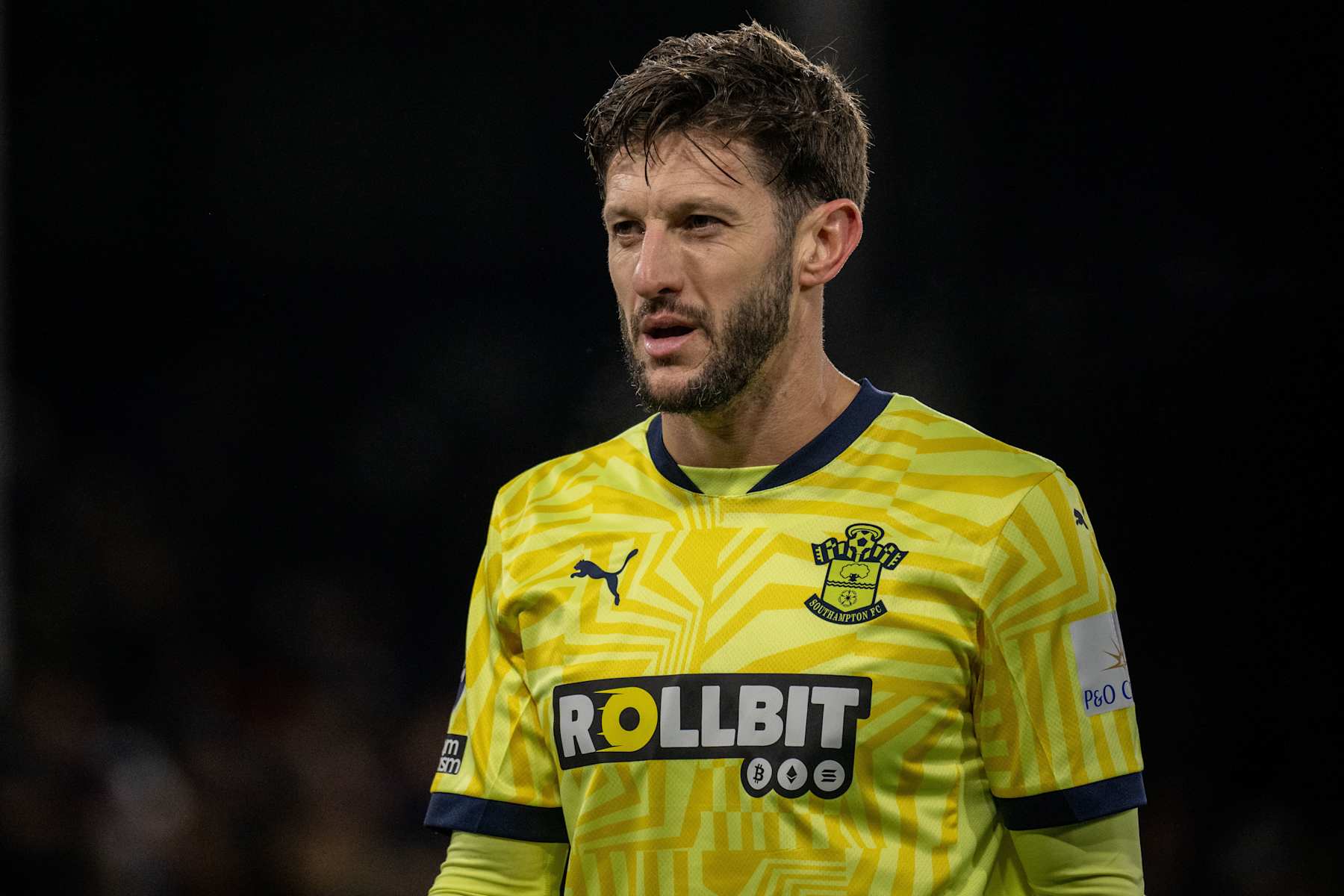 LONDON, ENGLAND - DECEMBER 29:Adam Lallana of Southampton FC looks on during the Premier League match between Crystal Palace FC and Southampton FC at Selhurst Park on December 29, 2024 in London, United Kingdom. (Photo by Sebastian Frej/MB Media/Getty Images)