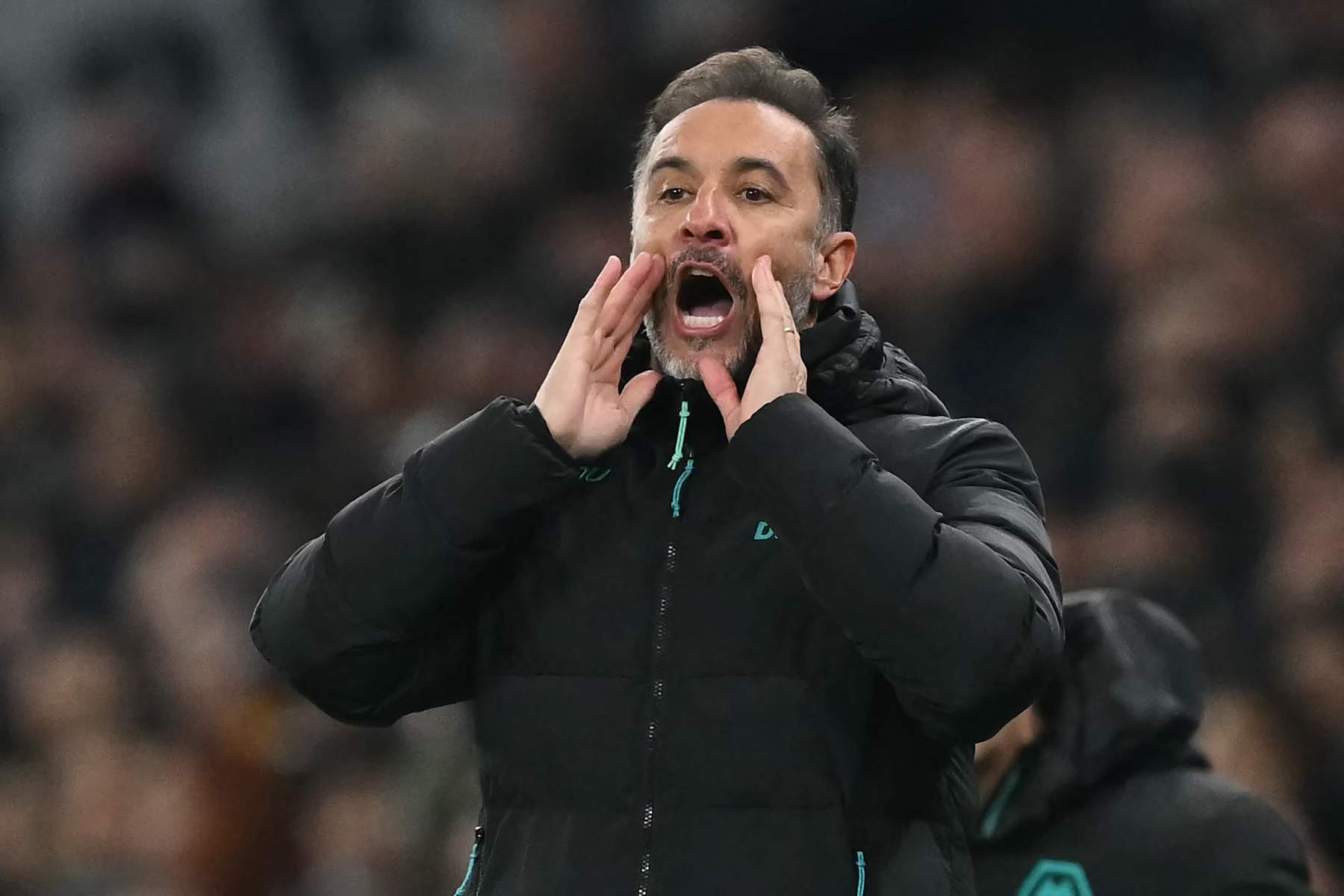 Wolverhampton Wanderers' Portuguese head coach Vitor Pereira gestures on the touchline during the English Premier League football match between Tottenham Hotspur and Wolverhampton Wanderers at the Tottenham Hotspur Stadium in London, on December 29, 2024. (Photo by Glyn KIRK / AFP) / RESTRICTED TO EDITORIAL USE. No use with unauthorized audio, video, data, fixture lists, club/league logos or 'live' services. Online in-match use limited to 120 images. An additional 40 images may be used in extra time. No video emulation. Social media in-match use limited to 120 images. An additional 40 images may be used in extra time. No use in betting publications, games or single club/league/player publications. / (Photo by GLYN KIRK/AFP via Getty Images)