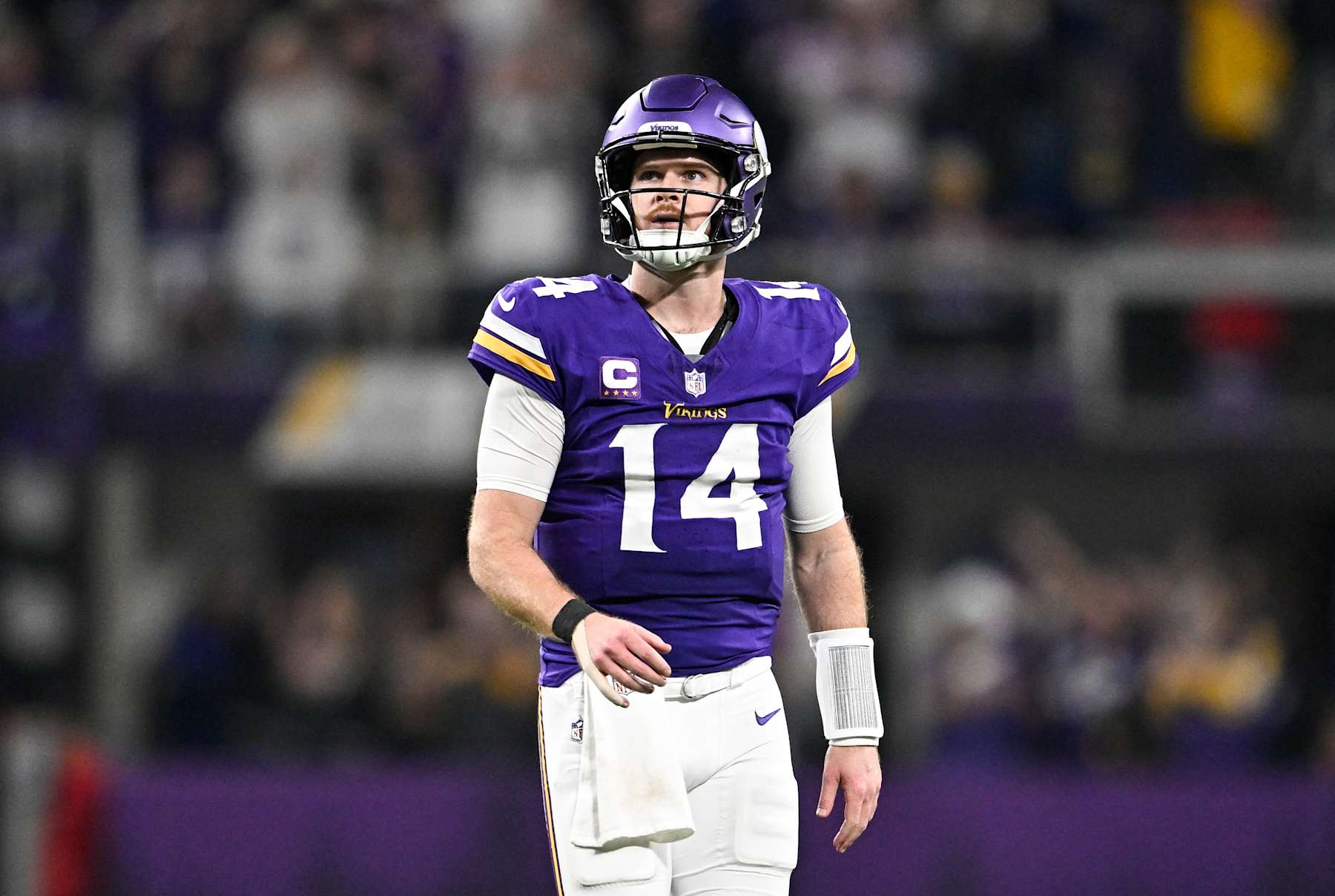 MINNEAPOLIS, MINNESOTA - DECEMBER 29: Quarterback Sam Darnold #14 of the Minnesota Vikings looks on after a play during the third quarter against the Green Bay Packers at U.S. Bank Stadium on December 29, 2024 in Minneapolis, Minnesota. (Photo by Stephen Maturen/Getty Images)
