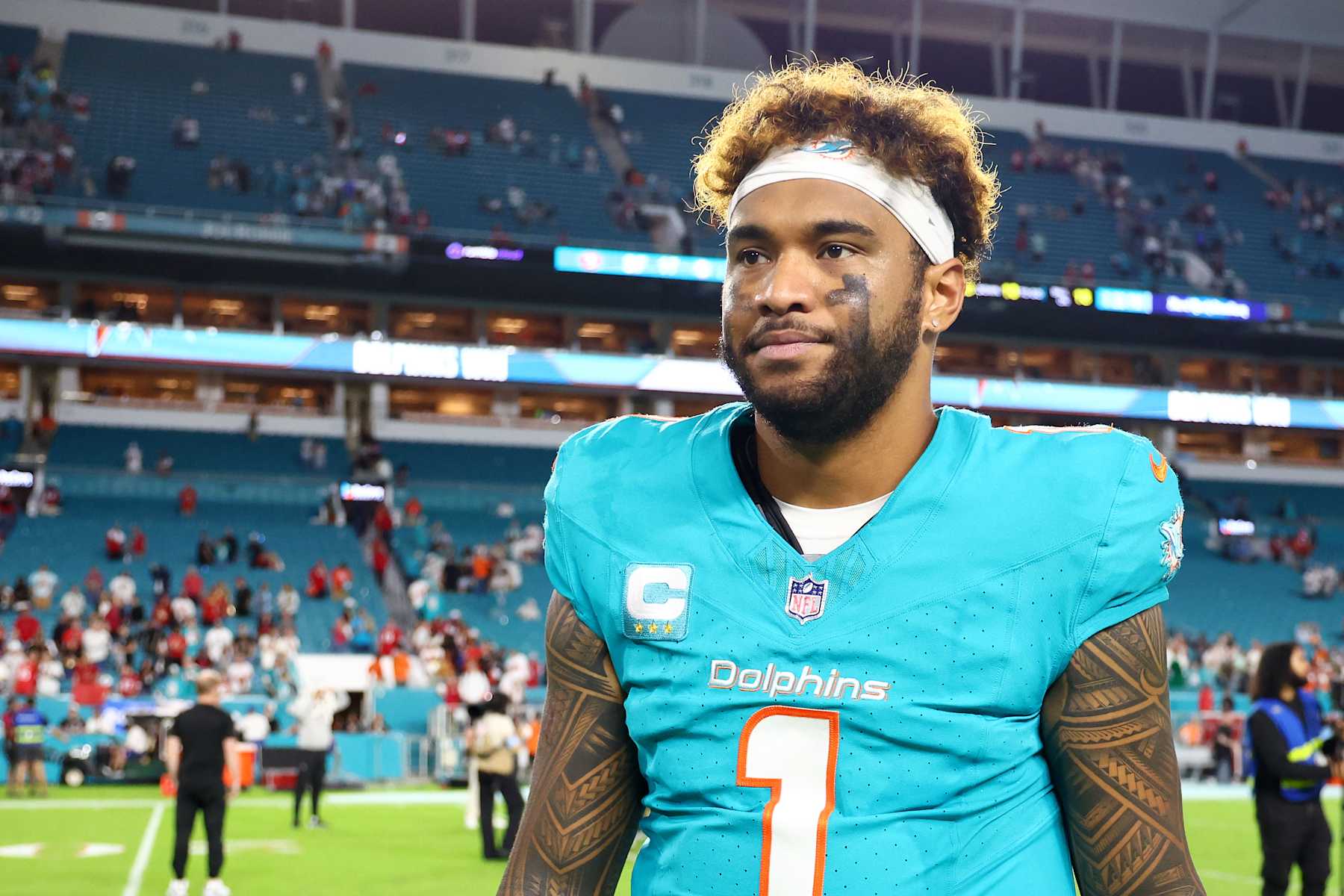 MIAMI GARDENS, FLORIDA - DECEMBER 22: Tua Tagovailoa #1 of the Miami Dolphins looks on after the 29-17 win against the San Francisco 49ers at Hard Rock Stadium on December 22, 2024 in Miami Gardens, Florida. (Photo by Megan Briggs/Getty Images)
