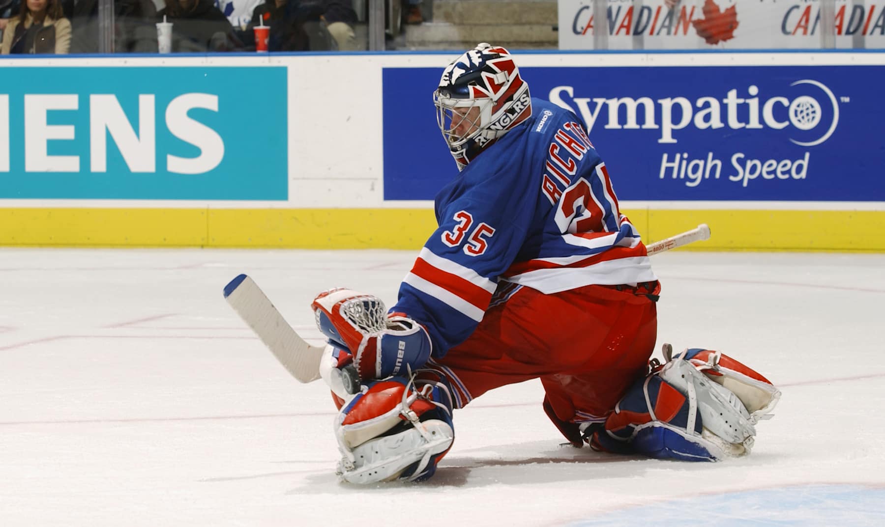 TORONTO - OCTOBER 26: The puck gets past the glove of goaltender Mike Richter #35 of the New York Rangers on a shot by the Toronto Maple Leafs during the NHL game on October 26, 2002 at the Air Canada Centre,Toronto, Canada. The Rangers won 4-3. (Photo by Dave Sandford/Getty Images/NHLI)