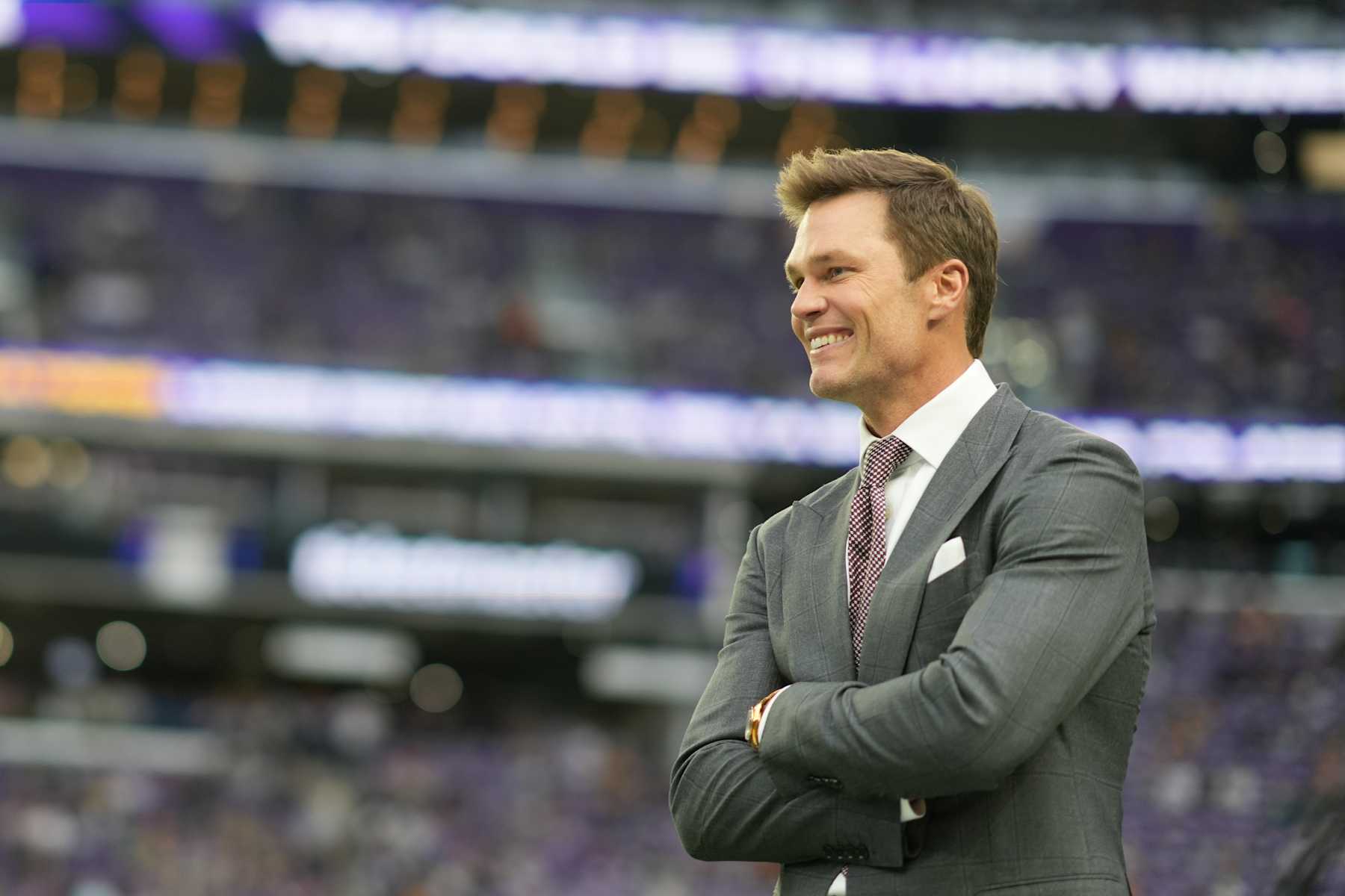 MINNEAPOLIS, MINNESOTA - DECEMBER 29: Former NFL player Tom Brady looks on prior to a game between the Green Bay Packers and the Minnesota Vikings at U.S. Bank Stadium on December 29, 2024 in Minneapolis, Minnesota. (Photo by Brace Hemmelgarn/Getty Images)