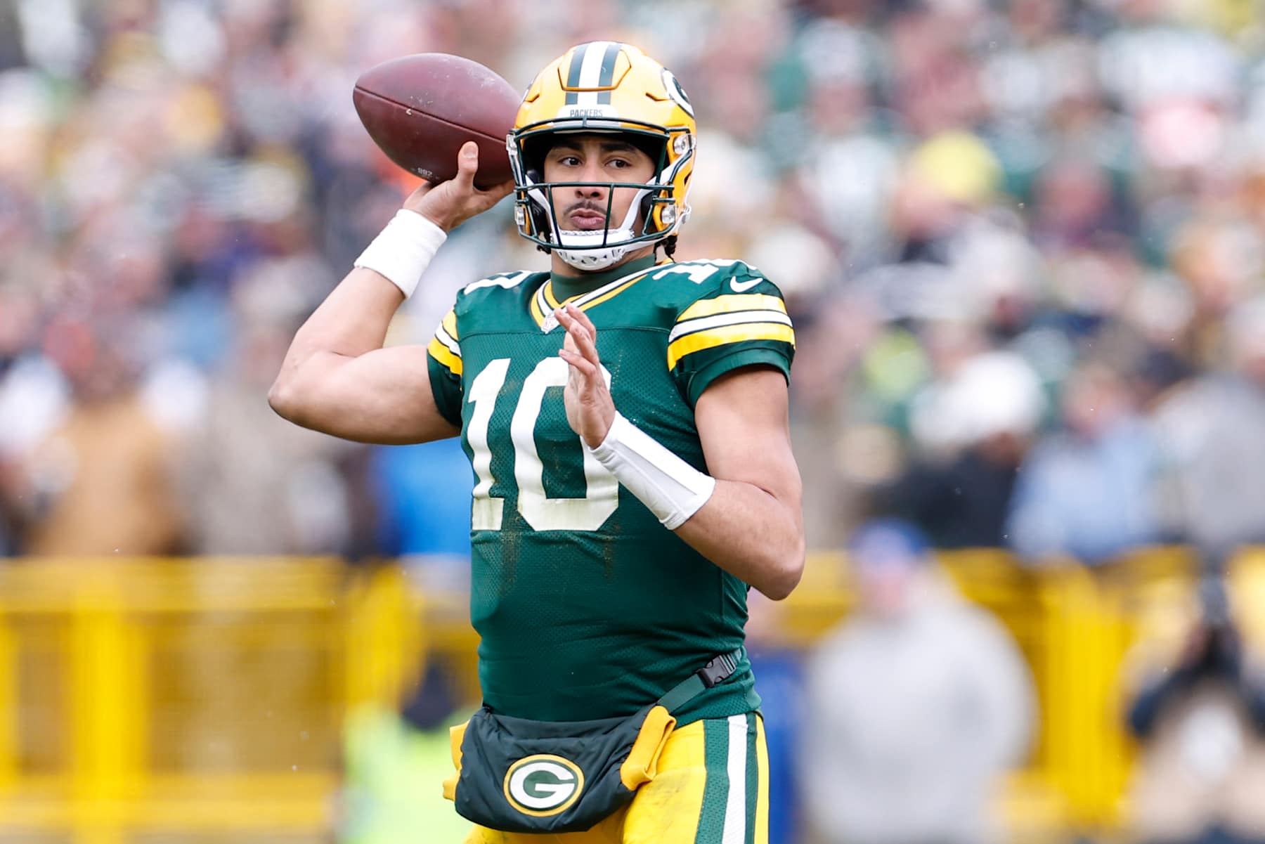 GREEN BAY, WISCONSIN - JANUARY 05: Jordan Love #10 of the Green Bay Packers throws a pass in the first quarter against the Chicago Bears at Lambeau Field on January 05, 2025 in Green Bay, Wisconsin. (Photo by John Fisher/Getty Images)