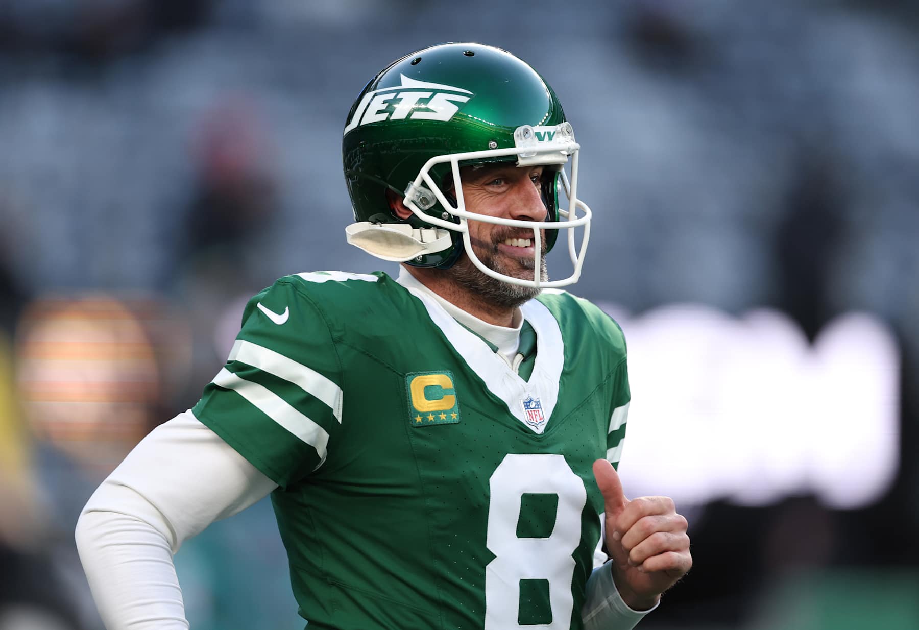 EAST RUTHERFORD, NEW JERSEY - JANUARY 05: Aaron Rodgers #8 of the New York Jets reacts before the game against the Miami Dolphins at MetLife Stadium on January 05, 2025 in East Rutherford, New Jersey. (Photo by Luke Hales/Getty Images)