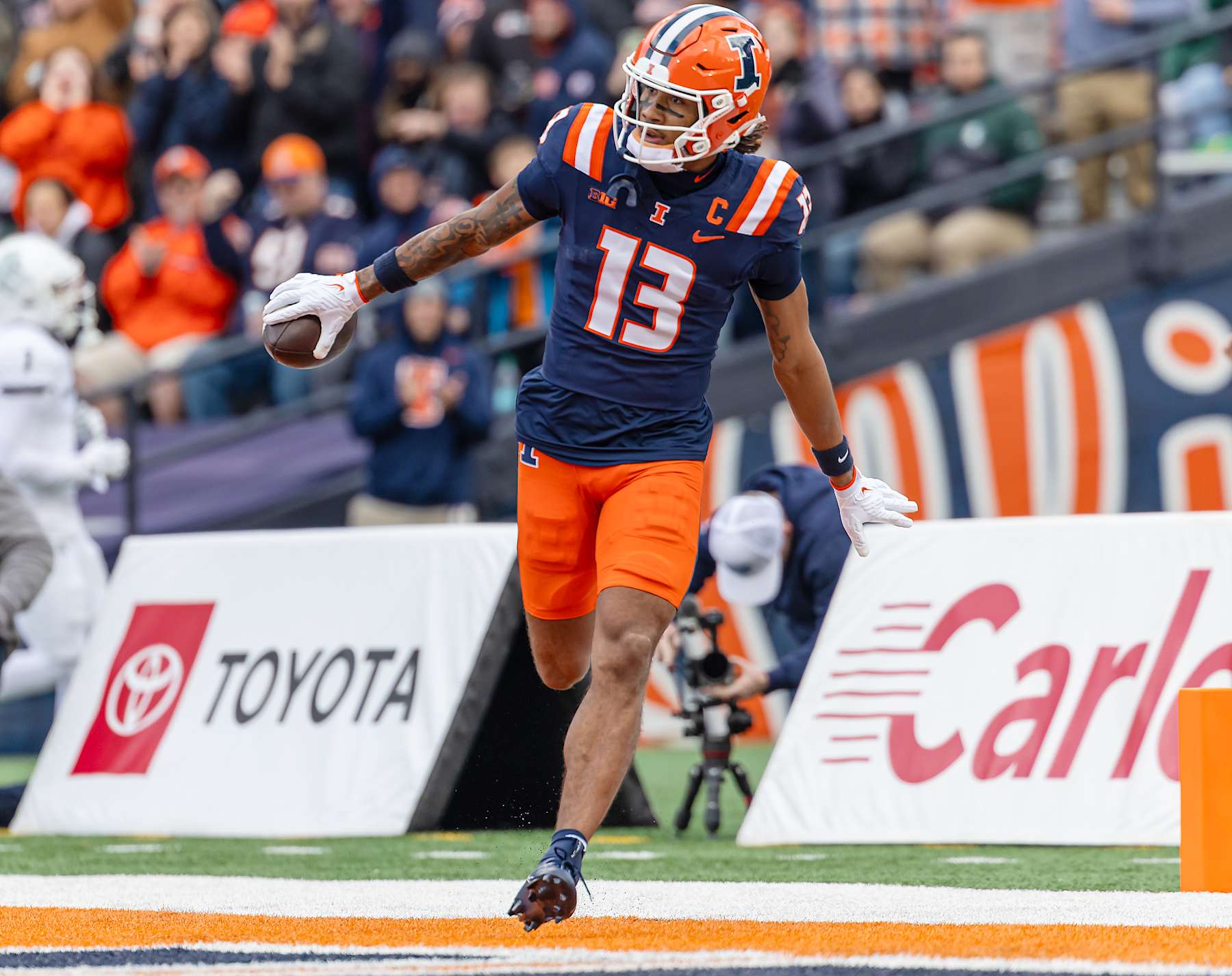 CHAMPAIGN, ILLINOIS - NOVEMBER 16: Pat Bryant #13 of the Illinois Fighting Illini celebrates after a touchdown during the first half against the Michigan State Spartans at Memorial Stadium on November 16, 2024 in Champaign, Illinois.  (Photo by Michael Hickey/Getty Images)