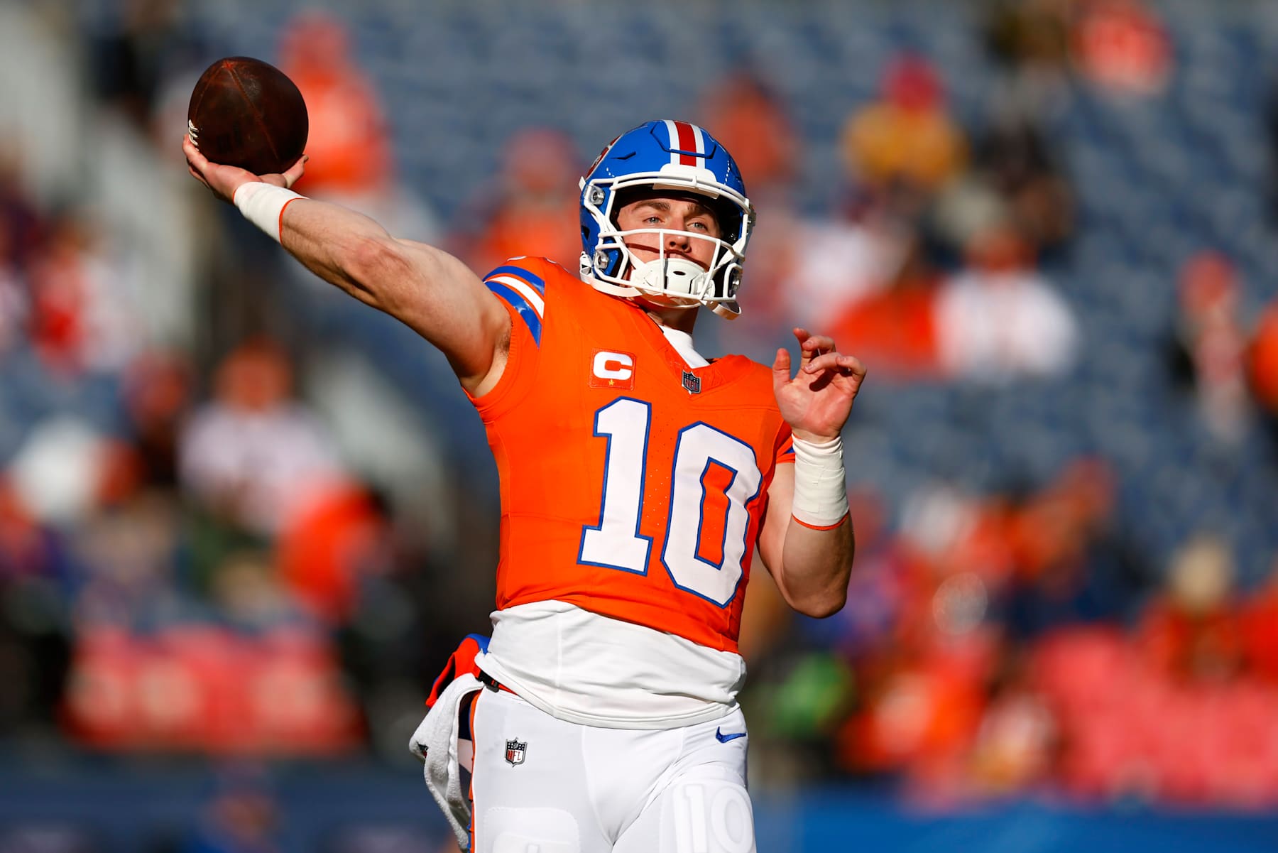 DENVER, COLORADO - JANUARY 05: Bo Nix #10 of the Denver Broncos warms up before the game against the Kansas City Chiefs at Empower Field At Mile High on January 05, 2025 in Denver, Colorado. (Photo by Justin Edmonds/Getty Images)