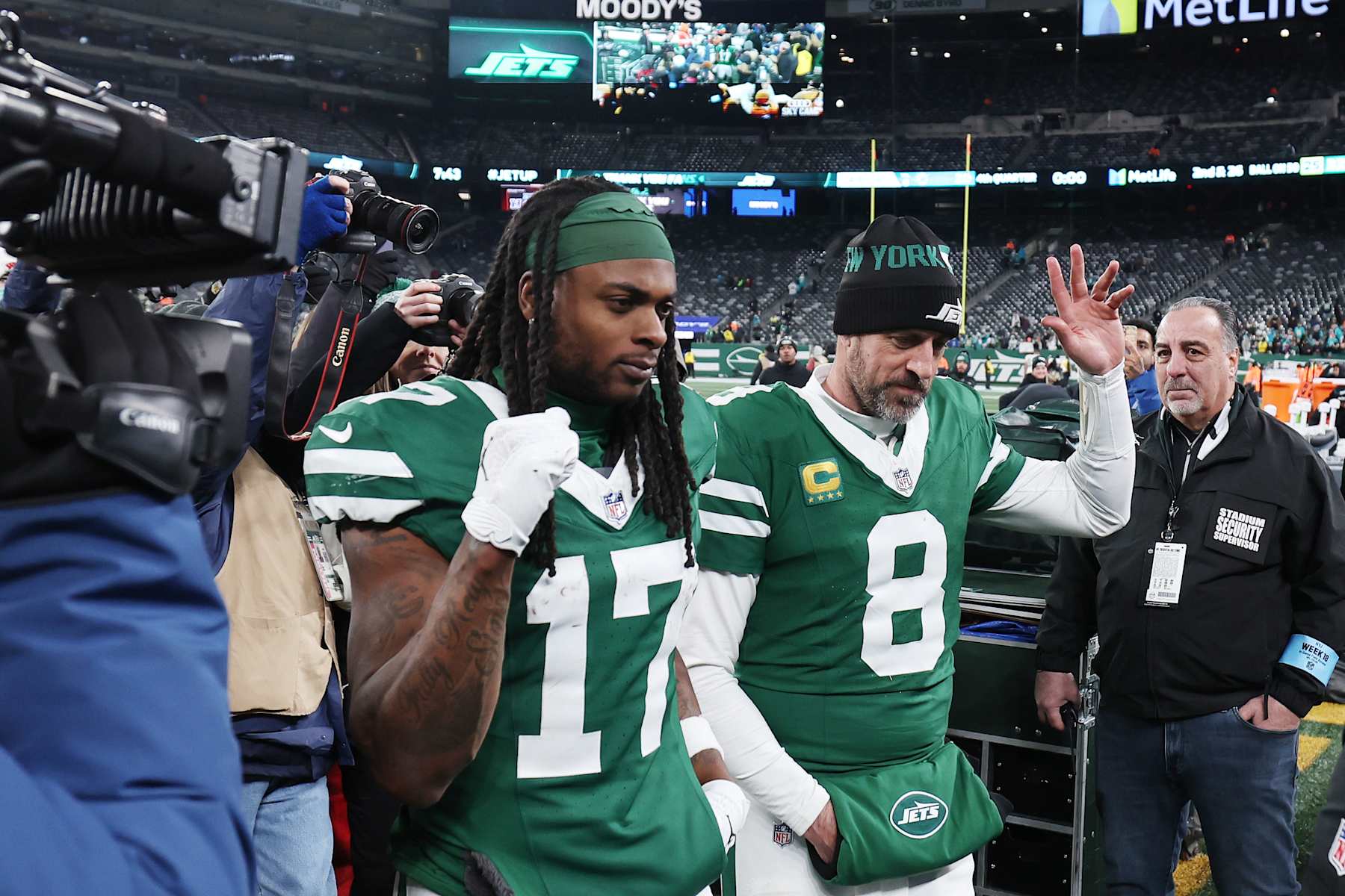 EAST RUTHERFORD, NEW JERSEY - JANUARY 05: Aaron Rodgers #8 and Davante Adams #17 of the New York Jets leave the field after beating the Miami Dolphins 32-20 at MetLife Stadium on January 05, 2025 in East Rutherford, New Jersey. (Photo by Luke Hales/Getty Images)