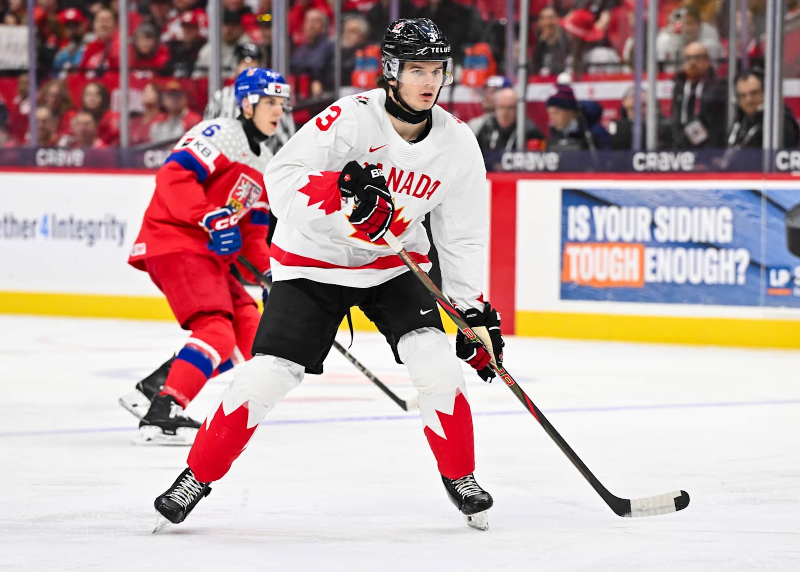 OTTAWA, CANADA - JANUARY 02:  Sam Dickinson #3 of Team Canada skates in the first period against Team Czechia of the quarterfinals match during the 2025 IIHF World Junior Championship at Canadian Tire Centre on January 2, 2025 in Ottawa, Ontario, Canada.  Team Czechia defeated Team Canada 4-3.  (Photo by Minas Panagiotakis/Getty Images)