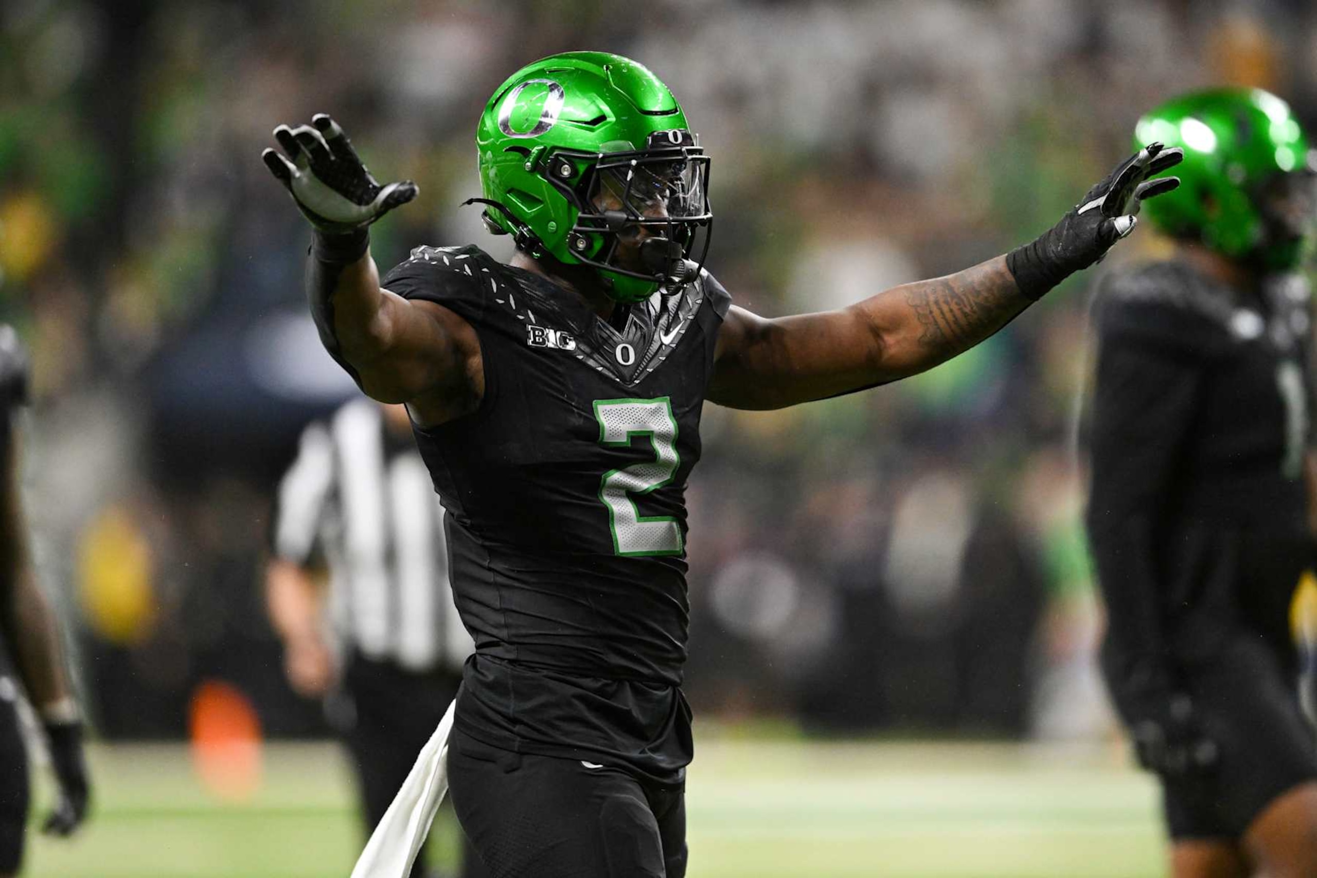 INDIANAPOLIS, IN - DECEMBER 07: Oregon Ducks ILB Jeffrey Bassa (2) signals an incomplete pass during the Big Ten Championship football game between the Penn State Nittany Lions and the Oregon Ducks on December 7, 2024 at Lucas Oil Stadium in Indianapolis, IN (Photo by James Black/Icon Sportswire via Getty Images)