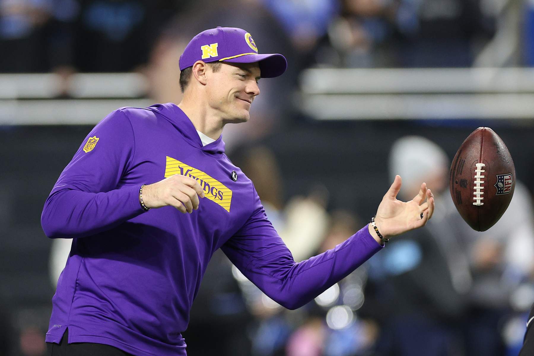 DETROIT, MICHIGAN - JANUARY 05: Head coach Kevin O’Connell of the Minnesota Vikings tosses a ball during pregame warmups prior to the game against the Detroit Lions at Ford Field on January 05, 2025 in Detroit, Michigan. (Photo by Mike Mulholland/Getty Images)