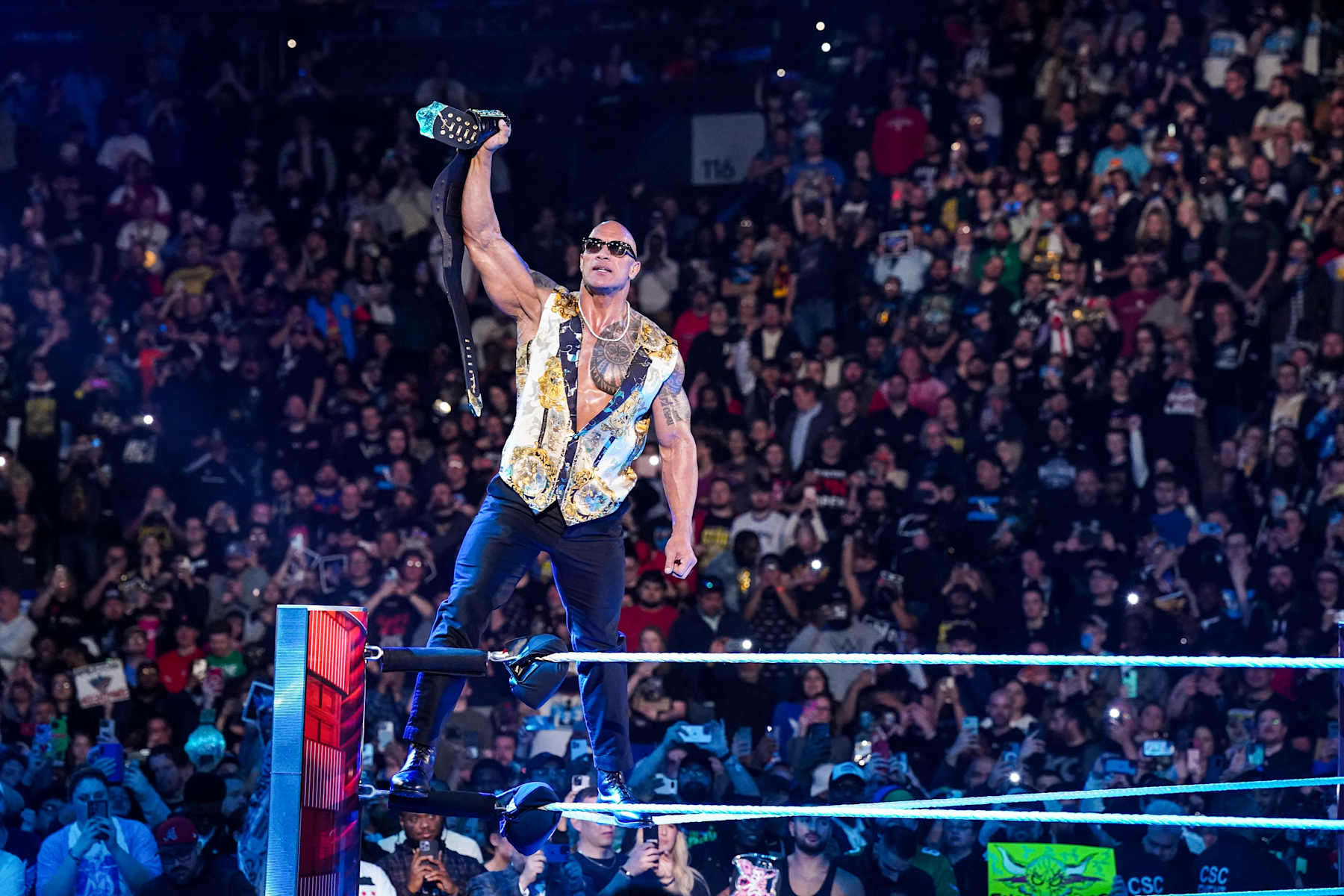PHILADELPHIA, PENNSYLVANIA - APRIL 08: Dwayne "The Rock" Johnson stands in ring at the Wells Fargo Center on April 8, 2024 in Philadelphia, Pennsylvania. (Photo by WWE/Getty Images)