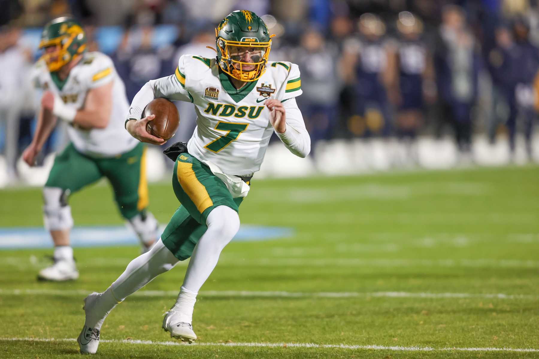 FRISCO, TX - JANUARY 06: North Dakota State Bison quarterback Cam Miller (7) runs with the ball during the FCS Championship game between North Dakota State and Montana State on January 6, 2025 at Toyota Stadium in Frisco, TX. (Photo by George Walker/Icon Sportswire via Getty Images)