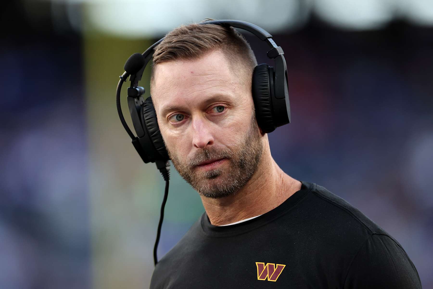 EAST RUTHERFORD, NEW JERSEY - NOVEMBER 03: Offensive coordinator Kliff Kingsbury of the Washington Commanders looks on against the New York Giants at MetLife Stadium on November 03, 2024 in East Rutherford, New Jersey. (Photo by Luke Hales/Getty Images)