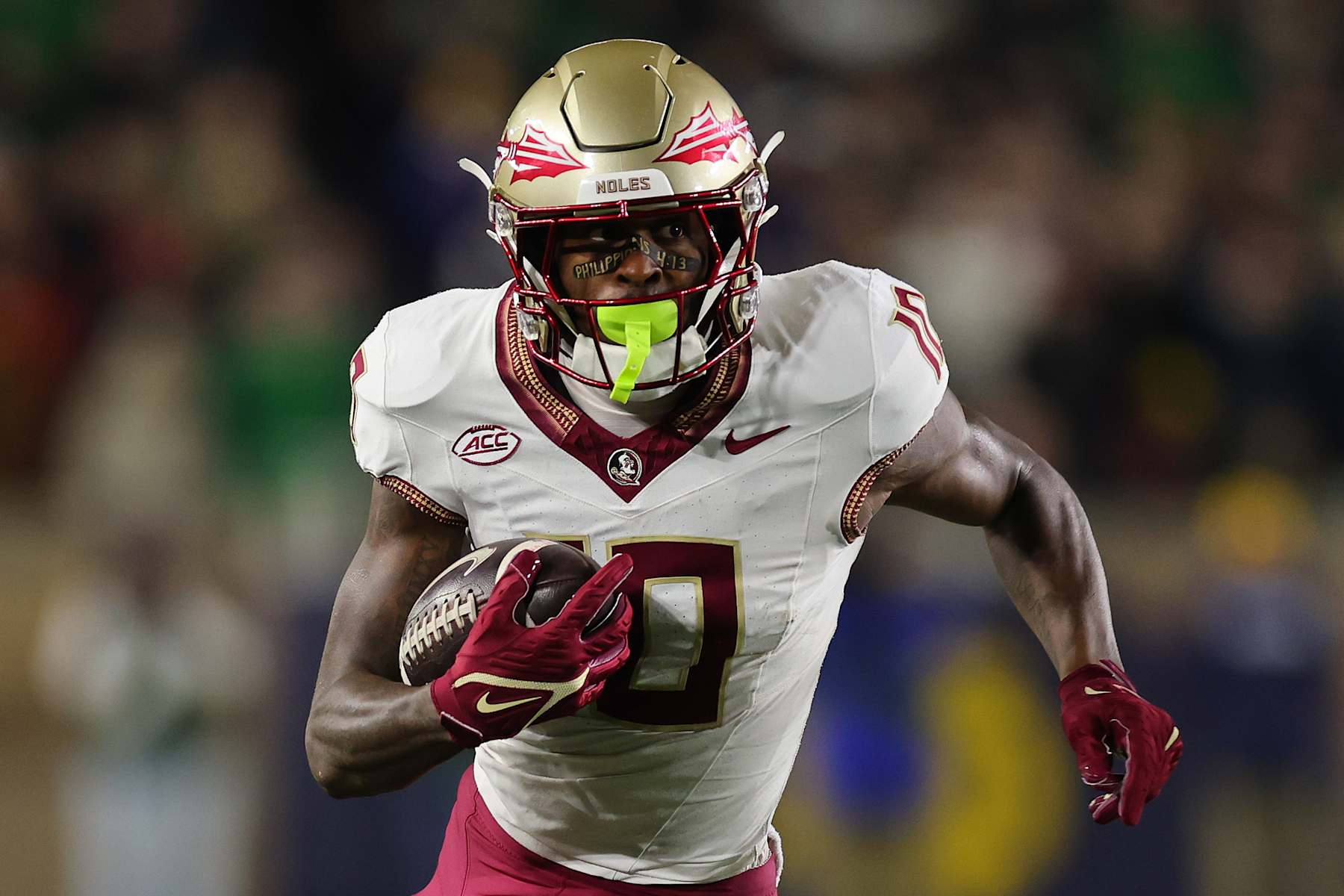 SOUTH BEND, INDIANA - NOVEMBER 09: Malik Benson #10 of the Florida State Seminoles runs with the ball against the Florida State Seminoles during the first half at Notre Dame Stadium on November 09, 2024 in South Bend, Indiana. (Photo by Michael Reaves/Getty Images)