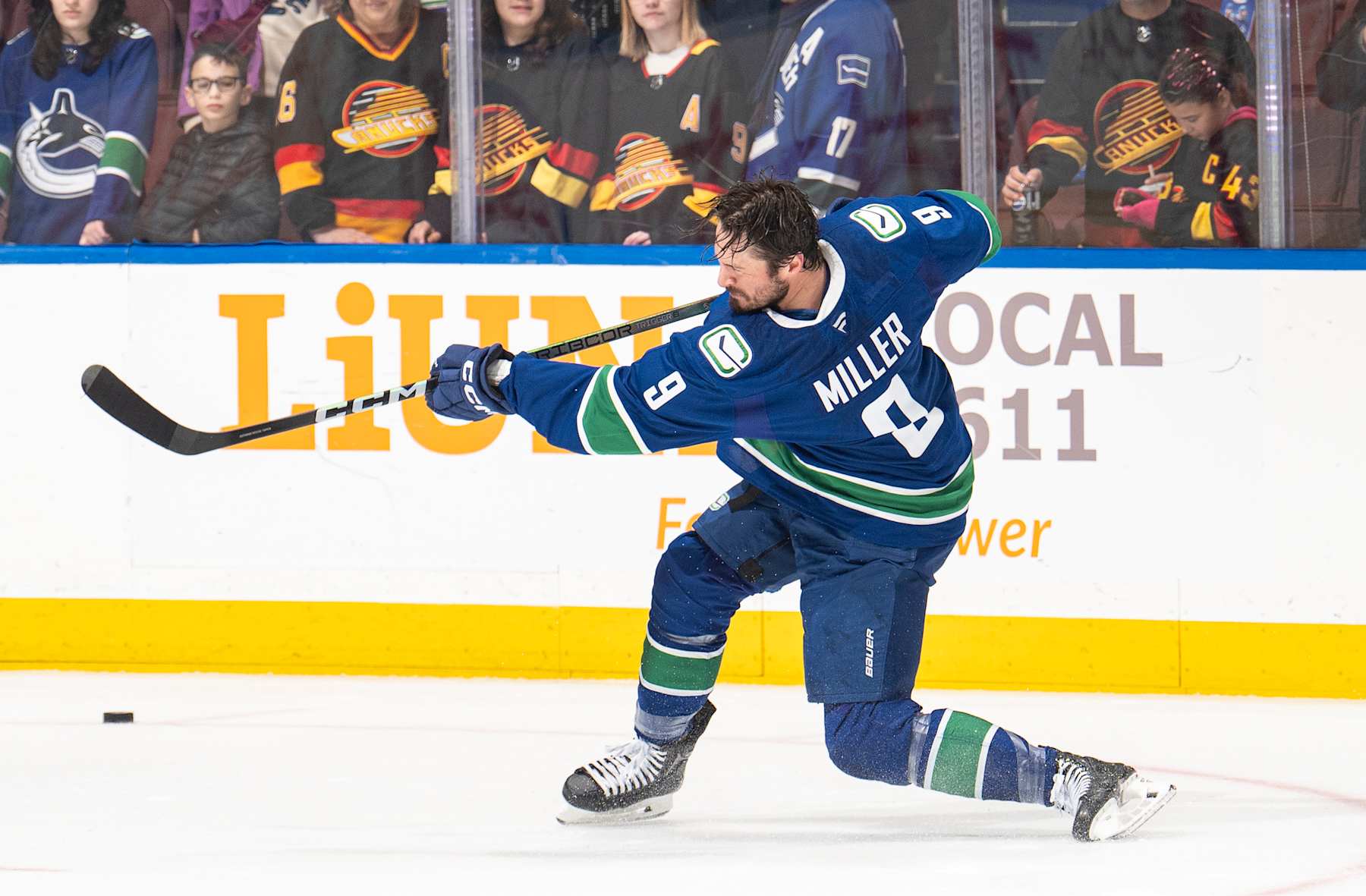 VANCOUVER, CANADA - JANUARY 3: J.T. Miller #9 of the Vancouver Canucks makes a shot during warmup before their NHL game against the Nashville Predators at Rogers Arena on January 3, 2025 in Vancouver, British Columbia, Canada.  (Photo by Jeff Vinnick/NHLI via Getty Images)