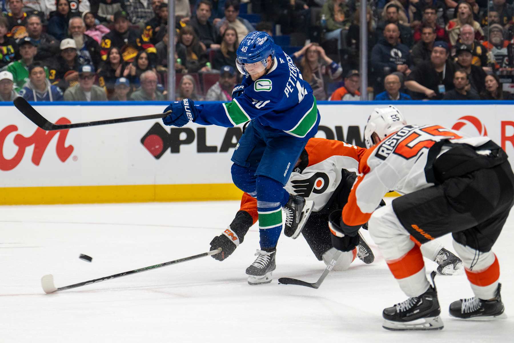 VANCOUVER, CANADA - OCTOBER 11:Elias Pettersson #40 of the Vancouver Canucks makes a shot during the third period of their NHL game against the Philadelphia Flyers at Rogers Arena on October 11, 2024 in Vancouver, British Columbia, Canada. (Photo by Jeff Vinnick/NHLI via Getty Images)