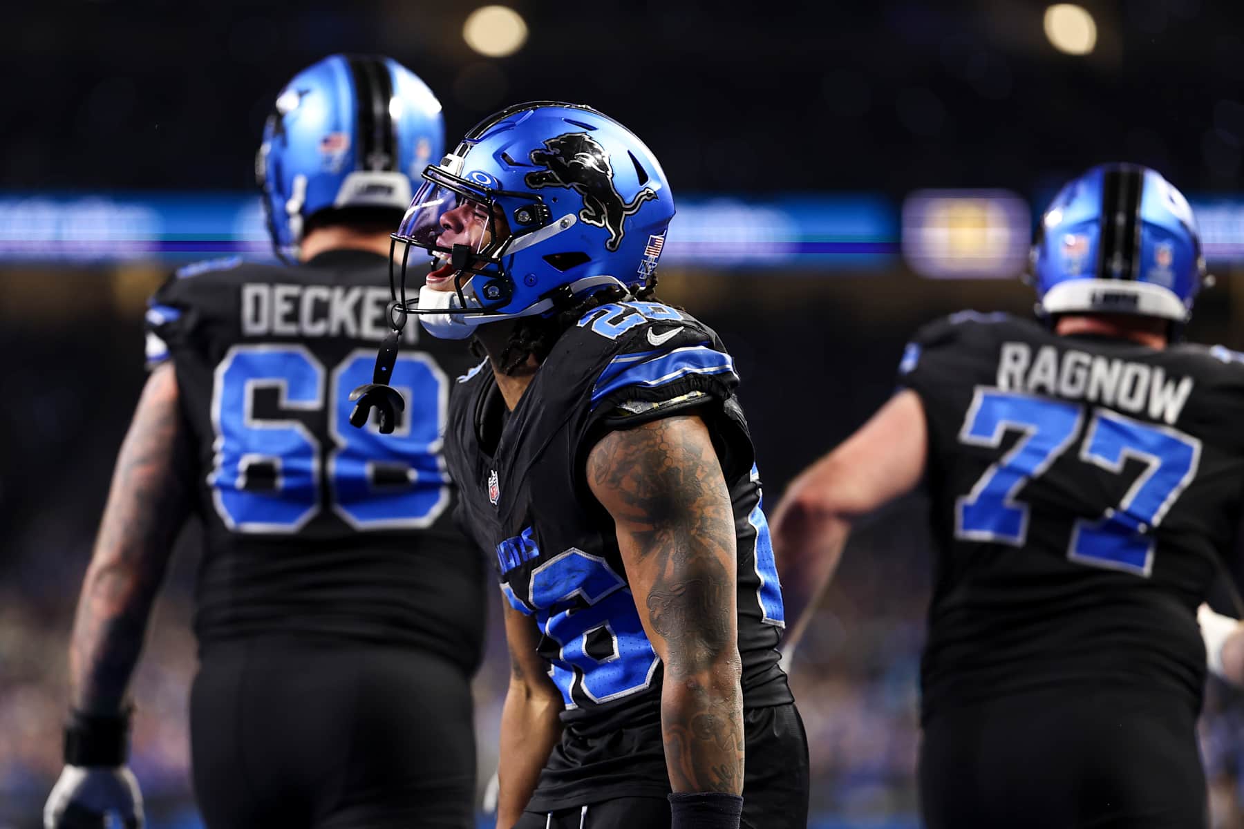 DETROIT, MICHIGAN - JANUARY 5: Jahmyr Gibbs #26 of the Detroit Lions celebrates after scoring a touchdown during the second half of an NFL football game against the Minnesota Vikings at Ford Field on January 5, 2025 in Detroit, Michigan. (Photo by Kevin Sabitus/Getty Images)