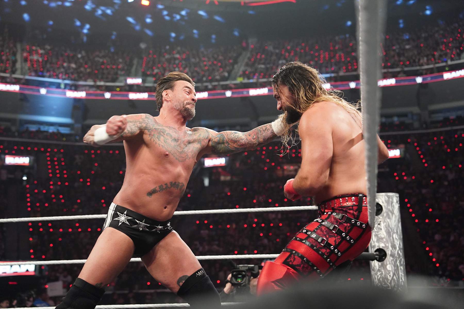 INGLEWOOD, CALIFORNIA - JANUARY 06: CM Punk and Seth Rollins in action during Monday Night RAW at Intuit Dome on January 6, 2025 in Inglewood, California.  (Photo by WWE/Getty Images)