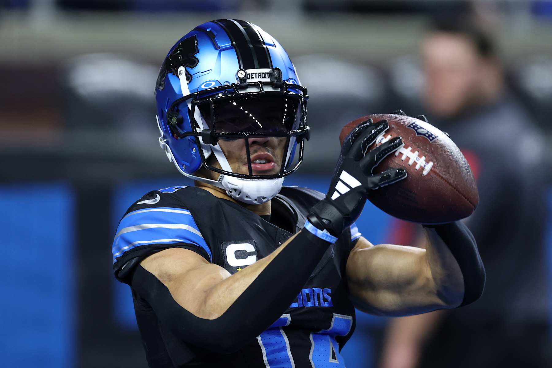 DETROIT, MICHIGAN - JANUARY 05: Amon-Ra St. Brown #14 of the Detroit Lions warms up prior to the game against the Minnesota Vikings at Ford Field on January 05, 2025 in Detroit, Michigan. (Photo by Gregory Shamus/Getty Images)