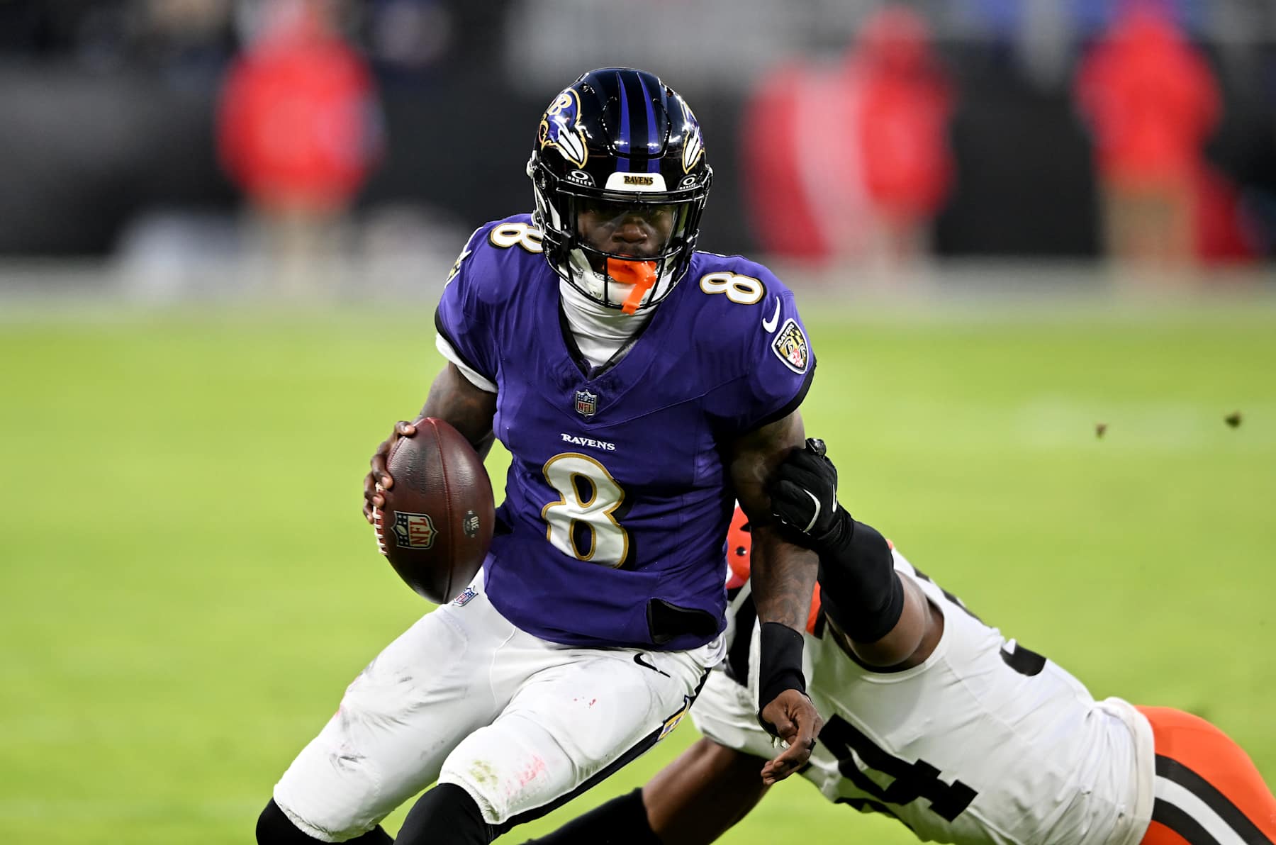 BALTIMORE, MARYLAND - JANUARY 04: Lamar Jackson #8 of the Baltimore Ravens runs with the ball against the Cleveland Browns at M&T Bank Stadium on January 04, 2025 in Baltimore, Maryland. (Photo by G Fiume/Getty Images)
