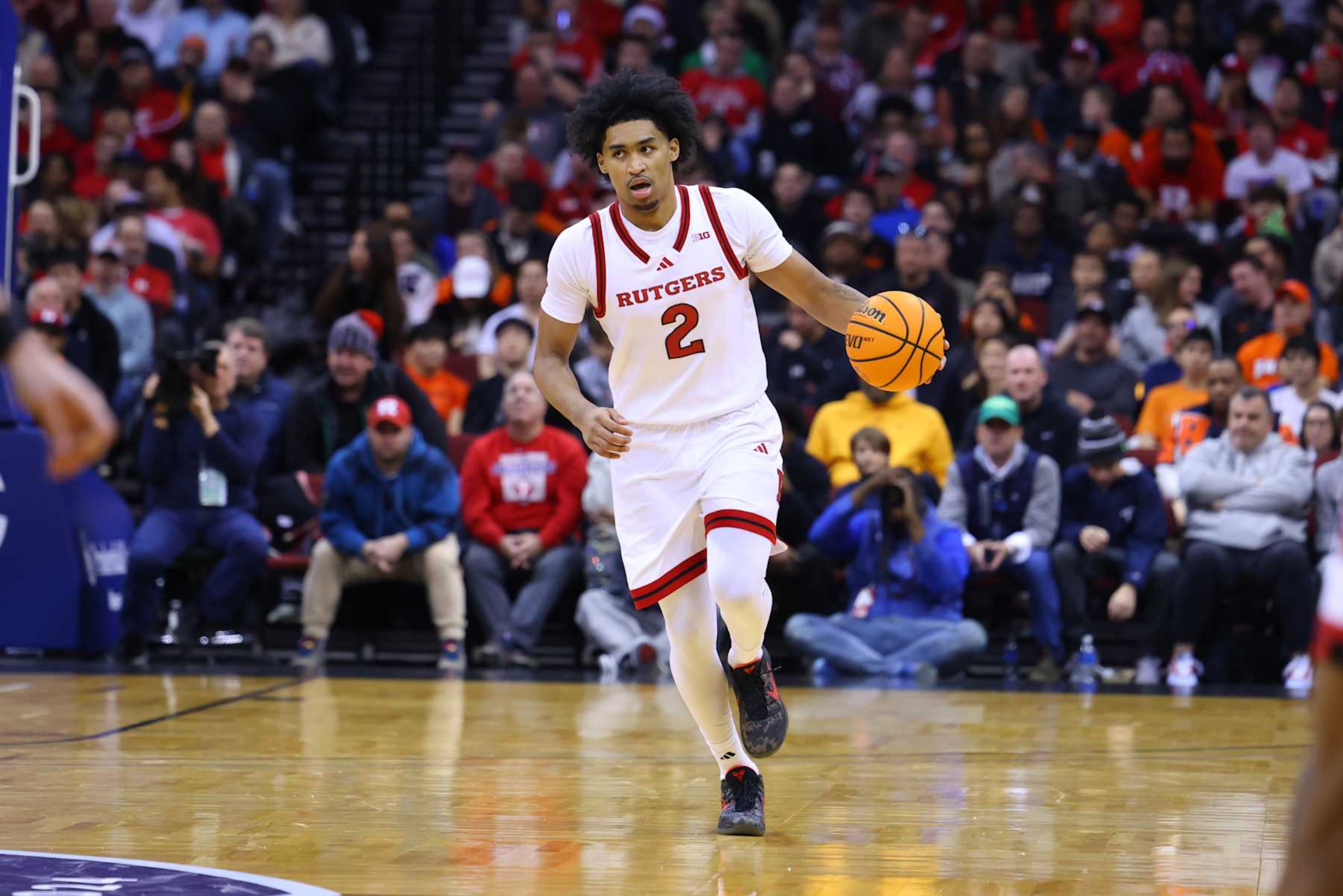 NEWARK, NJ - DECEMBER 21: Dylan Harper #2 of the Rutgers Scarlet Knights controls the ball during the second half of the Never Forget Tribute Classic game against the Princeton Tigers on December 21, 2024 at the Prudential Center in Newark, New Jersey. (Photo by Rich Graessle/Icon Sportswire via Getty Images) NEWARK, NJ - DECEMBER 21: Dylan Harper #2 of the Rutgers Scarlet Knights controls the ball during the second half of the Never Forget Tribute Classic game against the Princeton Tigers on December 21, 2024 at the Prudential Center in Newark, New Jersey. (Photo by Rich Graessle/Icon Sportswire via Getty Images)