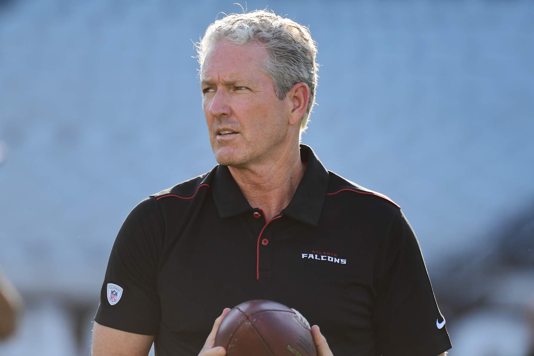 JACKSONVILLE, FLORIDA - AUGUST 29: Dirk Koetter of the Atlanta Falcons looks on during warmup before a preseason football game against the Jacksonville Jaguars at TIAA Bank Field on August 29, 2019 in Jacksonville, Florida. (Photo by Julio Aguilar/Getty Images)