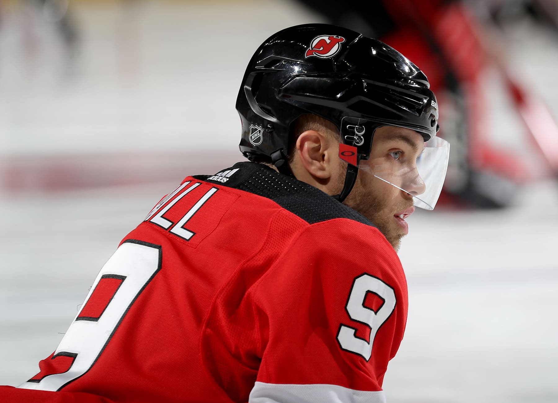 NEWARK, NEW JERSEY - DECEMBER 06: Taylor Hall #9 of the New Jersey Devils looks on during warm ups before the game against the Chicago Blackhawks at Prudential Center on December 06, 2019 in Newark, New Jersey. (Photo by Elsa/Getty Images)