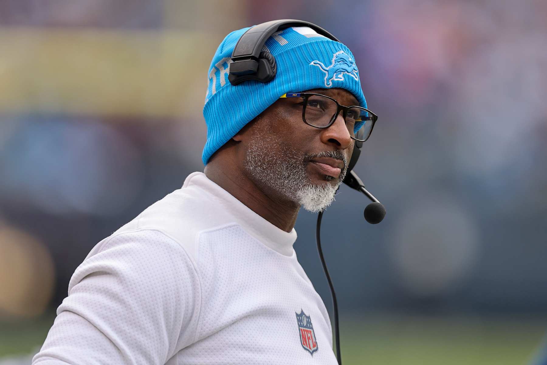 CHICAGO, ILLINOIS - DECEMBER 22: Defensive coordinator Aaron Glenn of the Detroit Lions looks on during the second half against the Chicago Bears at Soldier Field on December 22, 2024 in Chicago, Illinois. (Photo by Michael Reaves/Getty Images)
