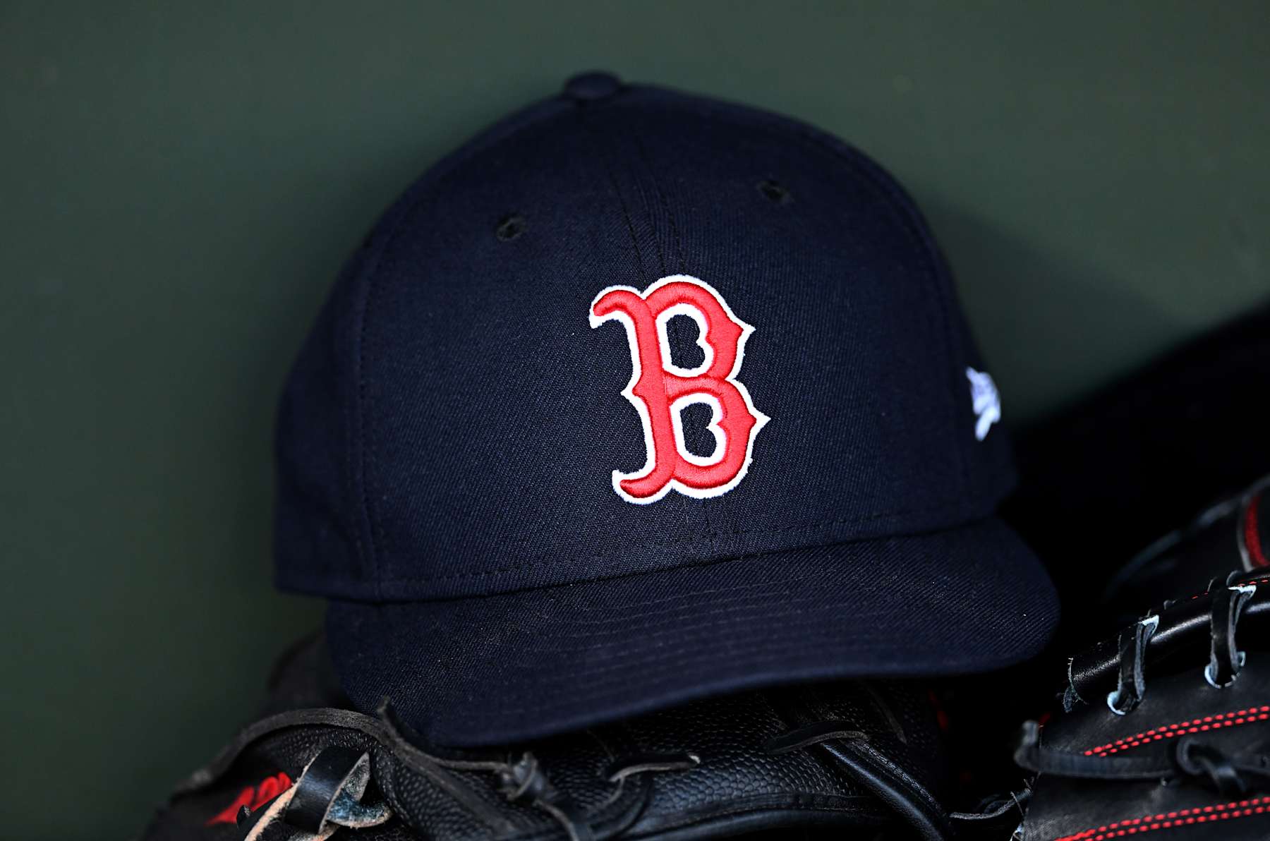 BALTIMORE, MARYLAND - AUGUST 15: A view of a Boston Red Sox baseball cap in the dugout before the game against the Baltimore Orioles at Oriole Park at Camden Yards on August 15, 2024 in Baltimore, Maryland. (Photo by G Fiume/Getty Images)