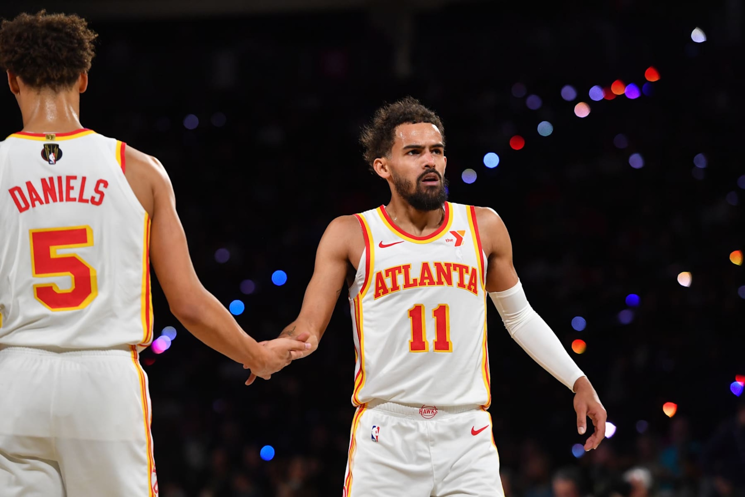 LAS VEGAS, NV - DECEMBER 14: Dyson Daniels #5 high fives Trae Young #11 of the Atlanta Hawks during the game against the Milwaukee Bucks during the Emirates NBA Cup Semifinal game on December 14, 2024 at T-Mobile Arena in Las Vegas, Nevada. NOTE TO USER: User expressly acknowledges and agrees that, by downloading and/or using this Photograph, user is consenting to the terms and conditions of the Getty Images License Agreement. Mandatory Copyright Notice: Copyright 2024 NBAE (Photo by Juan Ocampo/NBAE via Getty Images) LAS VEGAS, NV - DECEMBER 14: Dyson Daniels #5 high fives Trae Young #11 of the Atlanta Hawks during the game against the Milwaukee Bucks during the Emirates NBA Cup Semifinal game on December 14, 2024 at T-Mobile Arena in Las Vegas, Nevada. NOTE TO USER: User expressly acknowledges and agrees that, by downloading and/or using this Photograph, user is consenting to the terms and conditions of the Getty Images License Agreement. Mandatory Copyright Notice: Copyright 2024 NBAE (Photo by Juan Ocampo/NBAE via Getty Images)