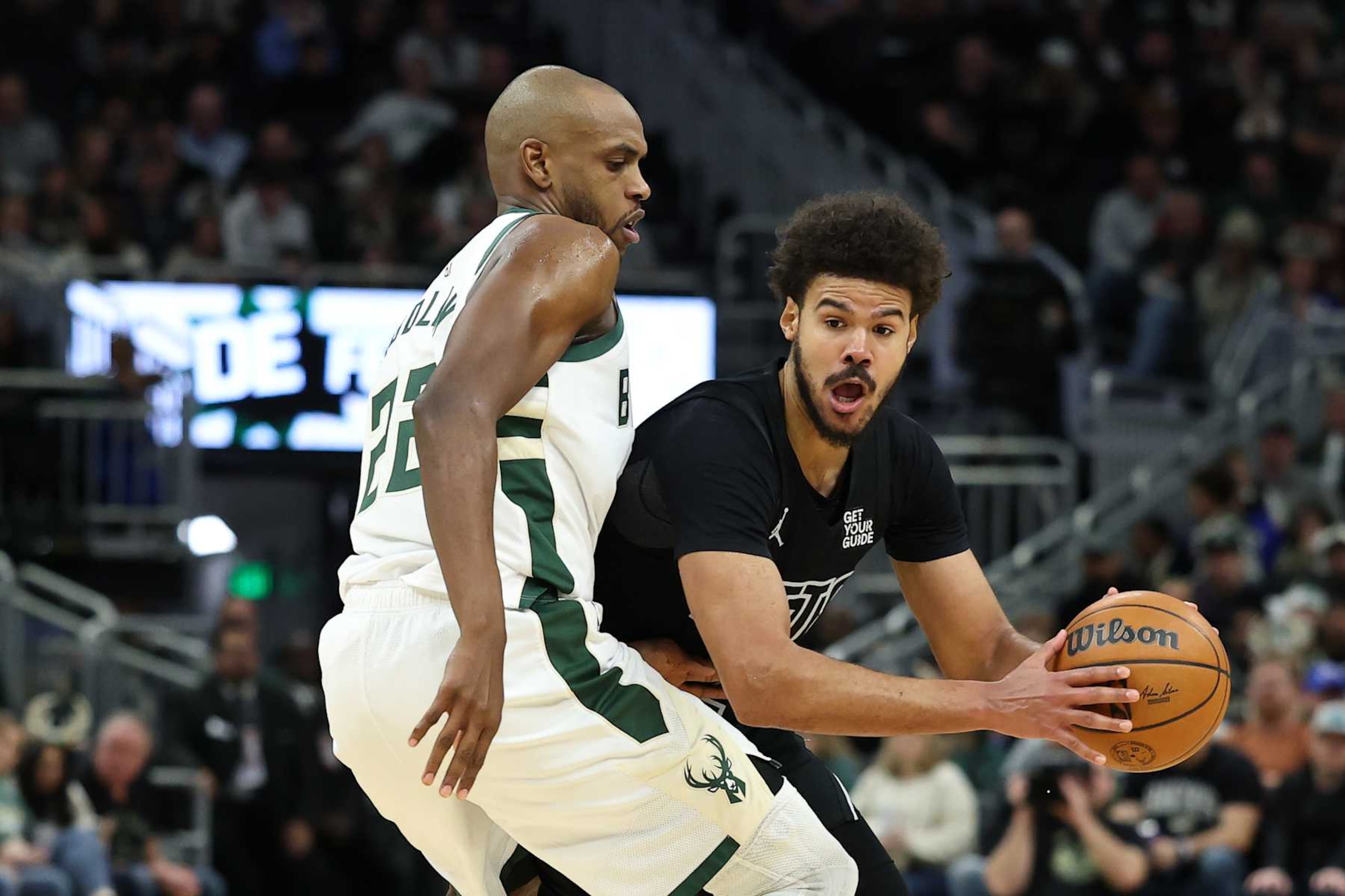 MILWAUKEE, WISCONSIN - JANUARY 02: Cameron Johnson #2 of the Brooklyn Nets is defended by Khris Middleton #22 of the Milwaukee Bucks during the second half of a game at Fiserv Forum on January 02, 2025 in Milwaukee, Wisconsin. NOTE TO USER: User expressly acknowledges and agrees that, by downloading and or using this photograph, User is consenting to the terms and conditions of the Getty Images License Agreement. (Photo by Stacy Revere/Getty Images) MILWAUKEE, WISCONSIN - JANUARY 02: Cameron Johnson #2 of the Brooklyn Nets is defended by Khris Middleton #22 of the Milwaukee Bucks during the second half of a game at Fiserv Forum on January 02, 2025 in Milwaukee, Wisconsin. NOTE TO USER: User expressly acknowledges and agrees that, by downloading and or using this photograph, User is consenting to the terms and conditions of the Getty Images License Agreement. (Photo by Stacy Revere/Getty Images)