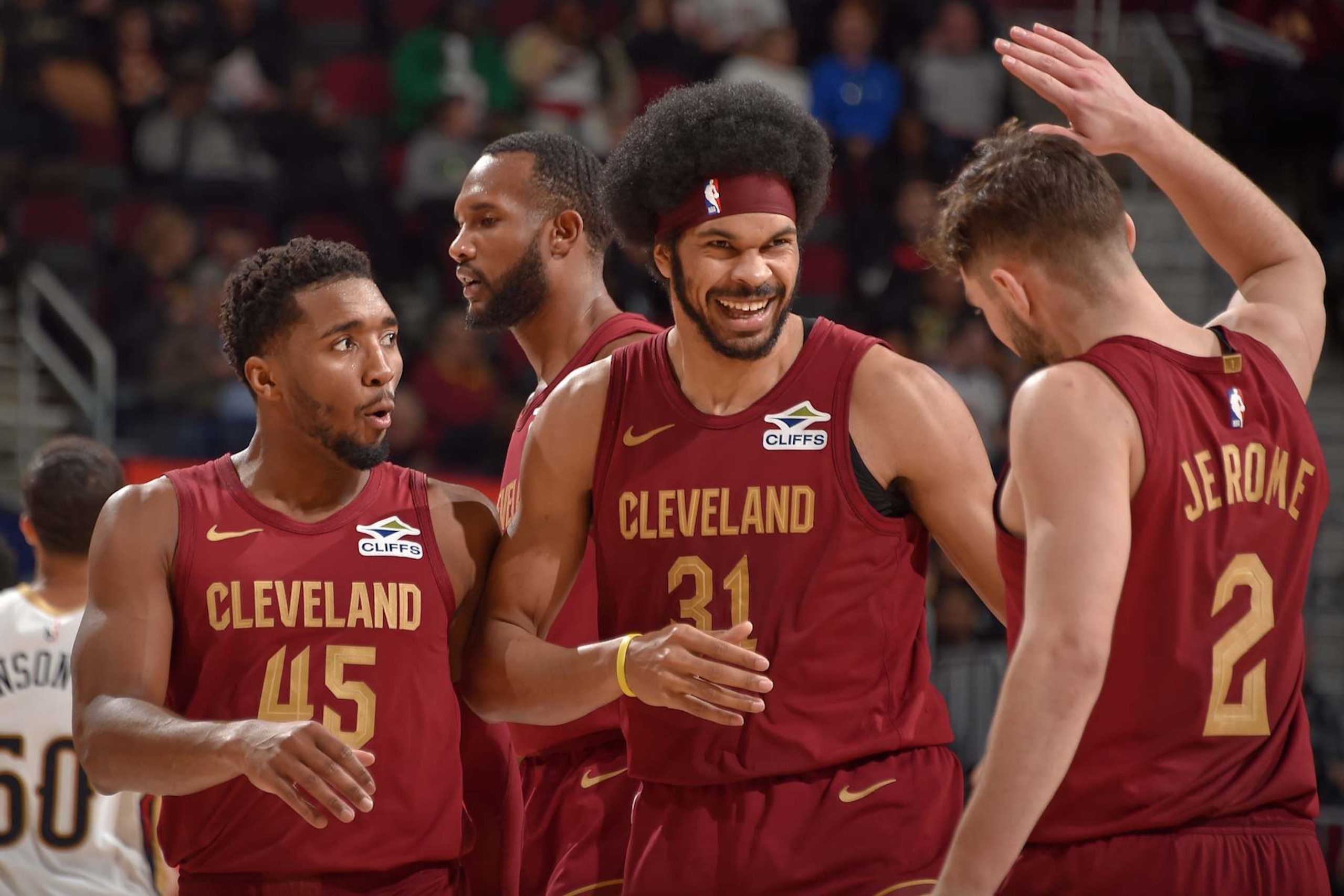 CLEVELAND, OH - NOVEMBER 20: Donovan Mitchell #45, Evan Mobley #4, Jarrett Allen #31 and Ty Jerome #2 of the Cleveland Cavaliers celebrate during the game against the New Orleans Pelicans on November 20, 2024 at Rocket Mortgage FieldHouse in Cleveland, Ohio. NOTE TO USER: User expressly acknowledges and agrees that, by downloading and/or using this Photograph, user is consenting to the terms and conditions of the Getty Images License Agreement. Mandatory Copyright Notice: Copyright 2024 NBAE (Photo by David Liam Kyle/NBAE via Getty Images) CLEVELAND, OH - NOVEMBER 20: Donovan Mitchell #45, Evan Mobley #4, Jarrett Allen #31 and Ty Jerome #2 of the Cleveland Cavaliers celebrate during the game against the New Orleans Pelicans on November 20, 2024 at Rocket Mortgage FieldHouse in Cleveland, Ohio. NOTE TO USER: User expressly acknowledges and agrees that, by downloading and/or using this Photograph, user is consenting to the terms and conditions of the Getty Images License Agreement. Mandatory Copyright Notice: Copyright 2024 NBAE (Photo by David Liam Kyle/NBAE via Getty Images)