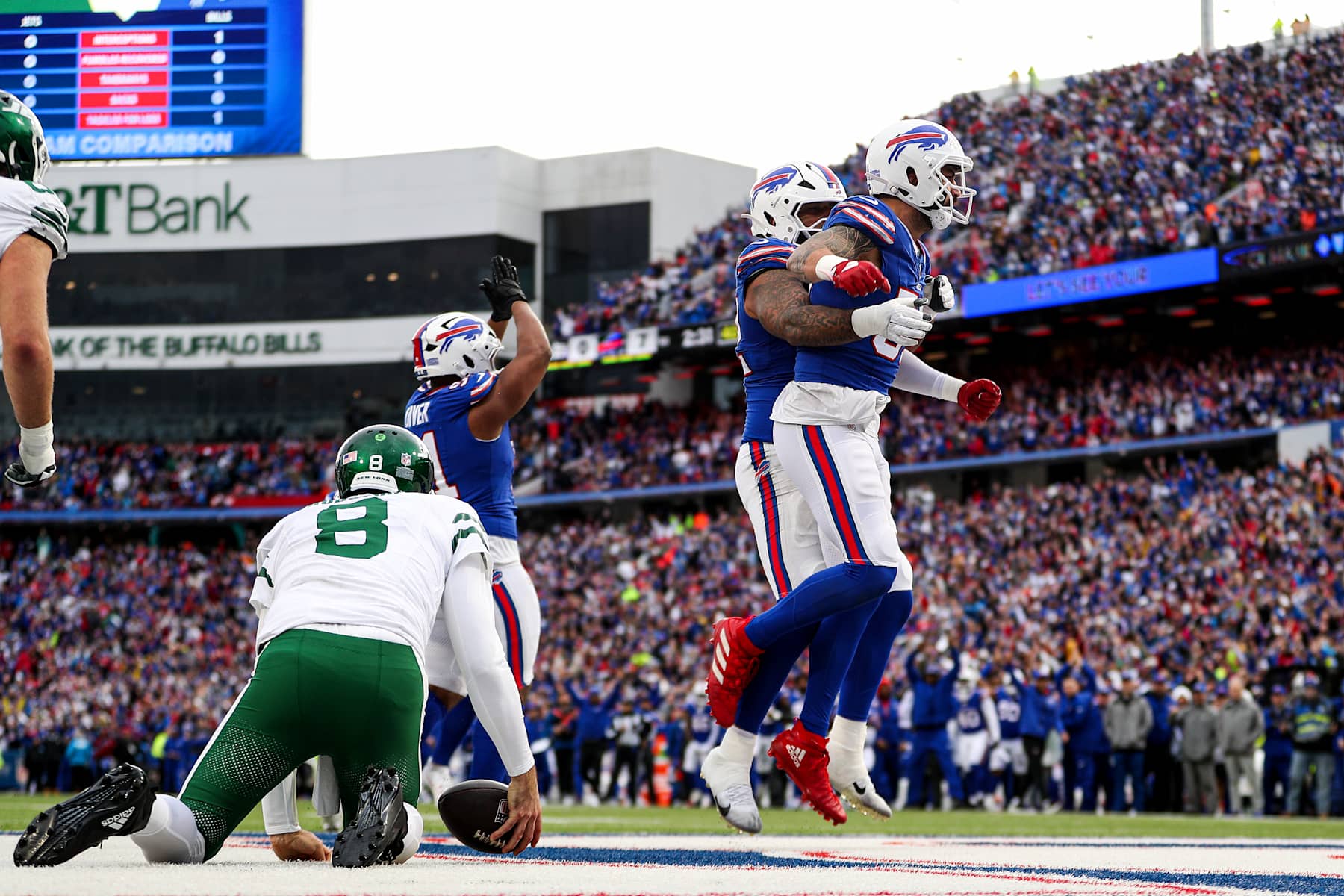 ORCHARD PARK, NEW YORK - DECEMBER 29: Ed Oliver #91, DaQuan Jones #92, and AJ Epenesa #57 of the Buffalo Bills celebrate after Epenesa sacked Aaron Rodgers #8 of the New York Jets during the second quarter at Highmark Stadium on December 29, 2024 in Orchard Park, New York. (Photo by Bryan Bennett/Getty Images)