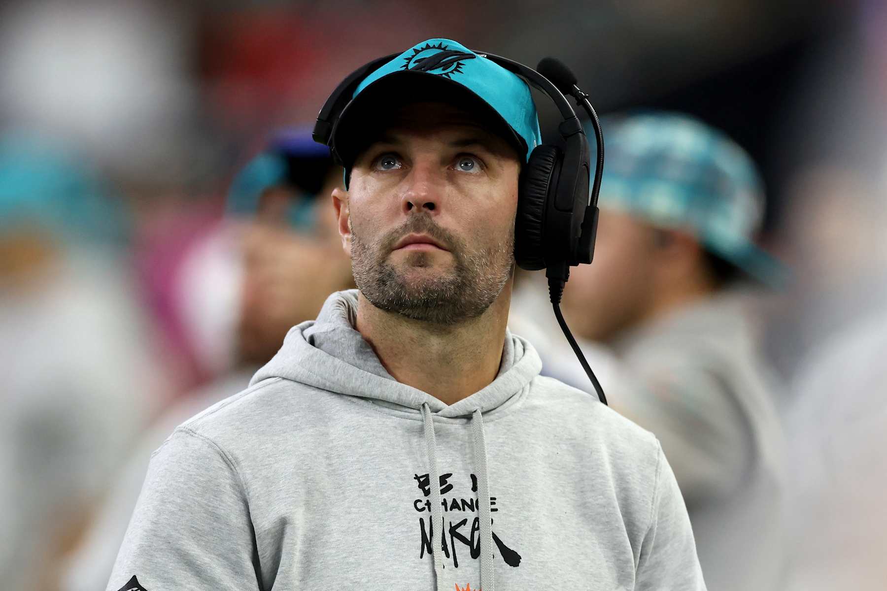 HOUSTON, TEXAS - DECEMBER 15: Wide receivers and passing game specialist Wes Welker of the Miami Dolphins watches on the sideline in the second half against the Houston Texans at NRG Stadium on December 15, 2024 in Houston, Texas. (Photo by Tim Warner/Getty Images)