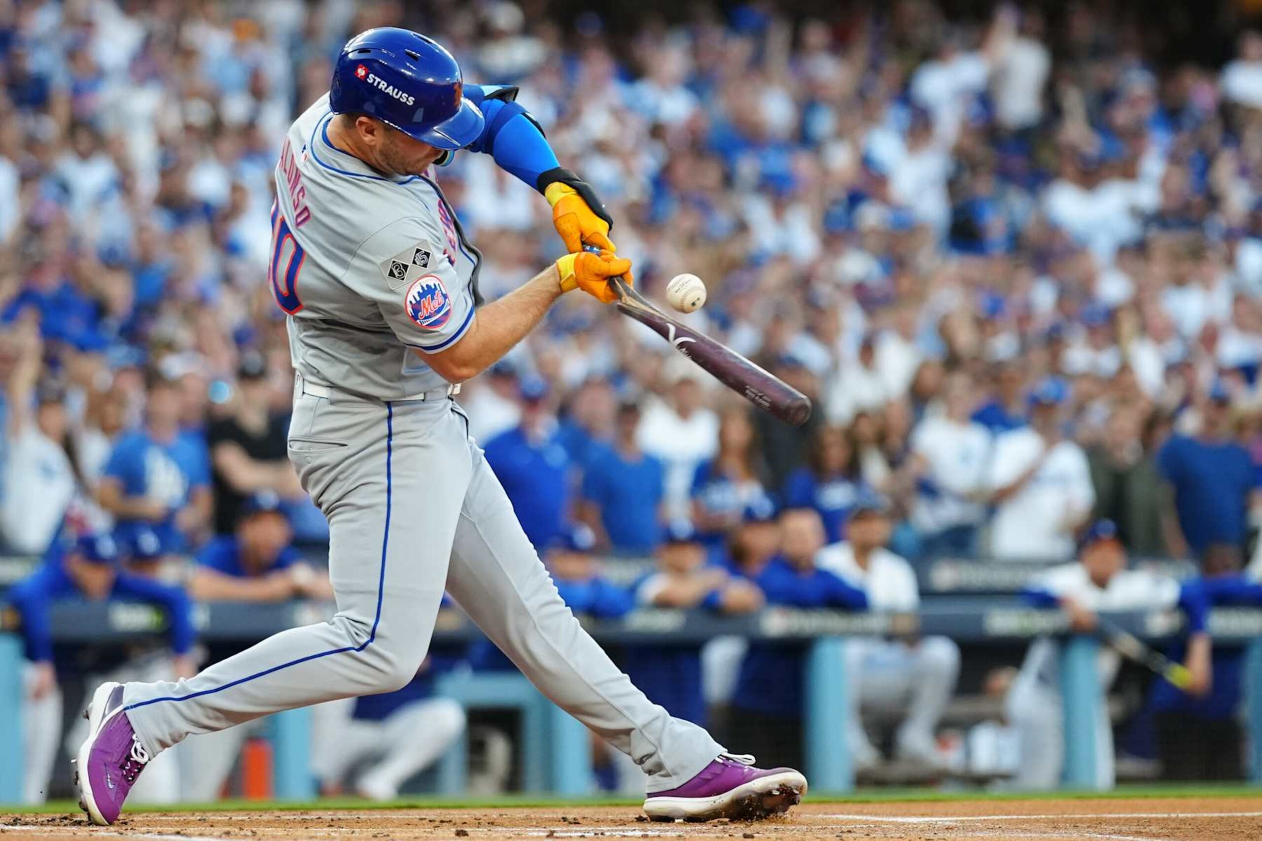 LOS ANGELES, CA - OCTOBER 20:   Pete Alonso #20 of the New York Mets hits a one RBI single in the first inning during Game 6 of the NLCS presented by loanDepot between the New York Mets and the Los Angeles Dodgers at Dodger Stadium on Sunday, October 20, 2024 in Los Angeles, California. (Photo by Daniel Shirey/MLB Photos via Getty Images)