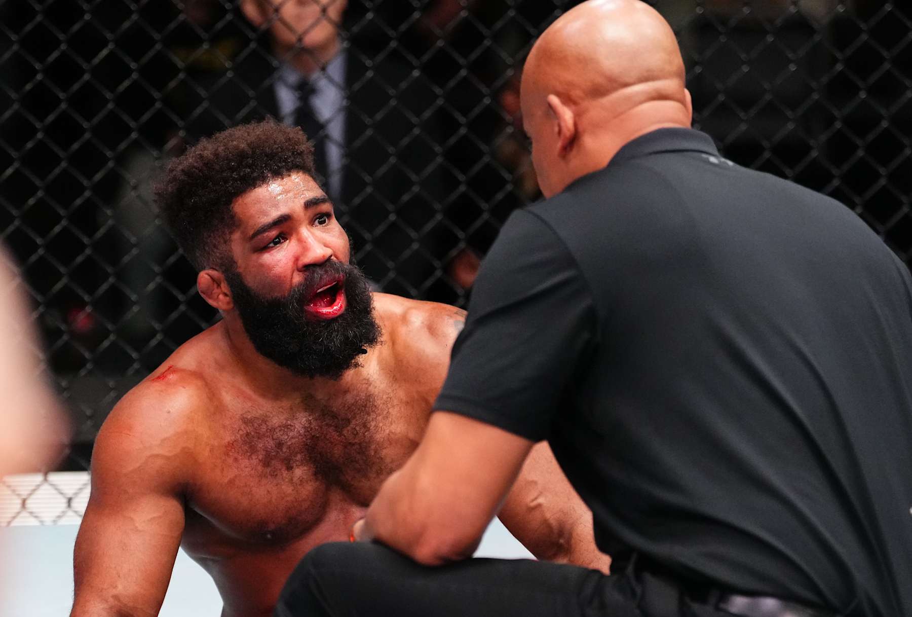 LAS VEGAS, NEVADA - JANUARY 11: Chris Curtis protests to referee Mark Smith after a stoppage at 4:59 of the final round against Roman Kopylov of Russia in a middleweight fight during the UFC Fight Night event at UFC APEX on January 11, 2025 in Las Vegas, Nevada. (Photo by Chris Unger/Zuffa LLC via Getty Images)
