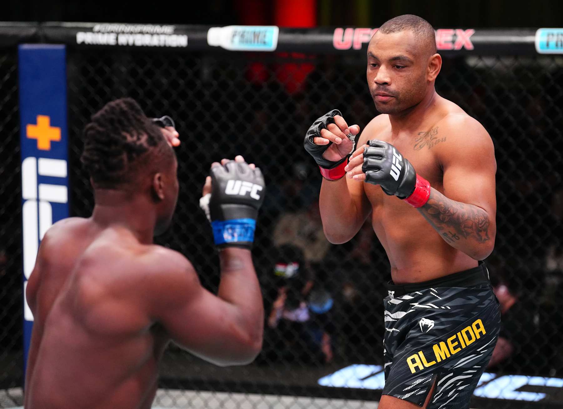 LAS VEGAS, NEVADA - JANUARY 11: (R-L) Cesar Almeida of Brazil battles Abdul Razak Alhassan of Ghana in a middleweight fight during the UFC Fight Night event at UFC APEX on January 11, 2025 in Las Vegas, Nevada. (Photo by Chris Unger/Zuffa LLC via Getty Images)