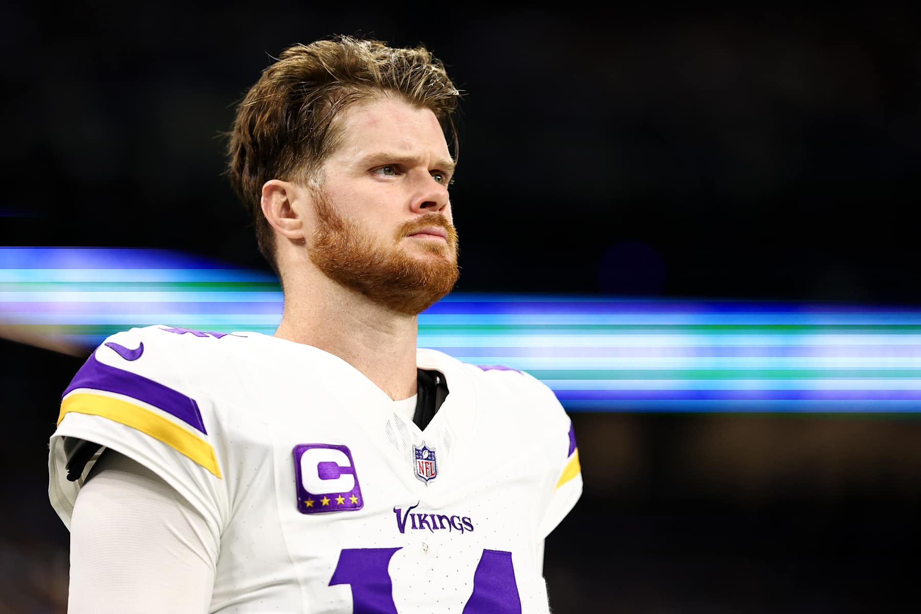 DETROIT, MICHIGAN - JANUARY 5: Sam Darnold #14 of the Minnesota Vikings stands on the sidelines during the national anthem prior to an NFL football game against the Detroit Lions at Ford Field on January 5, 2025 in Detroit, Michigan. (Photo by Kevin Sabitus/Getty Images)