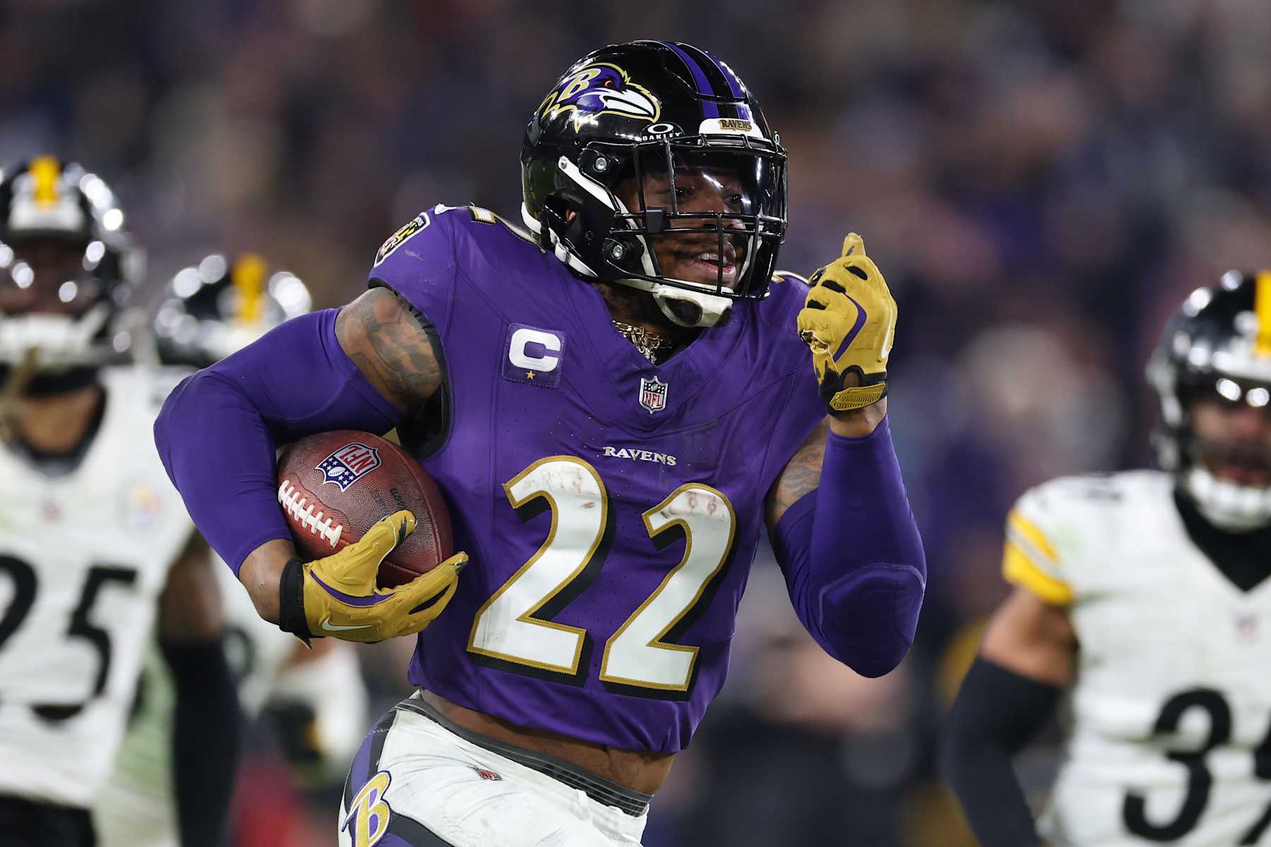 BALTIMORE, MARYLAND - JANUARY 11: Derrick Henry #22 of the Baltimore Ravens runs the ball for a touchdown during the third quarter against the Pittsburgh Steelers during the AFC Wild Card Playoff at M&T Bank Stadium on January 11, 2025 in Baltimore, Maryland.  (Photo by Al Bello/Getty Images)