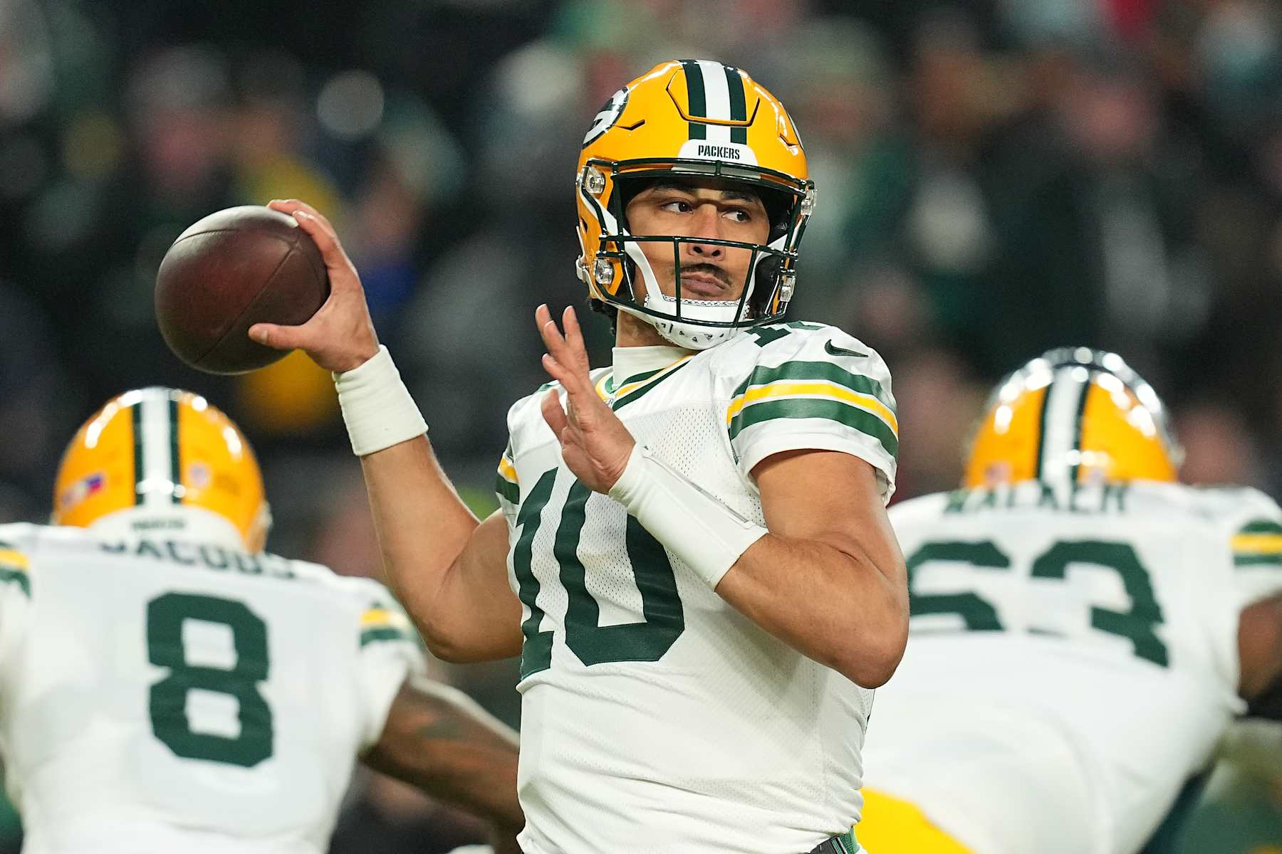 PHILADELPHIA, PENNSYLVANIA - JANUARY 12: Jordan Love #10 of the Green Bay Packers looks to pass in the first quarter of a game against the Philadelphia Eagles during the NFC Wild Card Playoff at Lincoln Financial Field on January 12, 2025 in Philadelphia, Pennsylvania.  (Photo by Mitchell Leff/Getty Images)