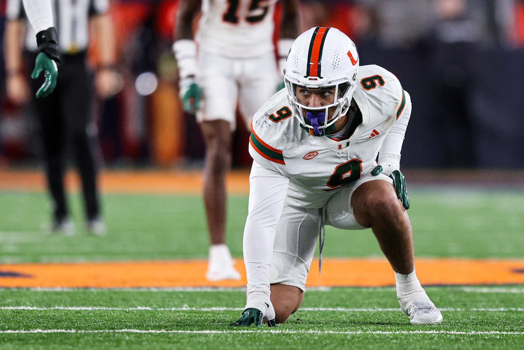 SYRACUSE, NEW YORK - NOVEMBER 30: Tyler Baron #9 of the Miami Hurricanes lines up during the second quarter against the Syracuse Orange at JMA Wireless Dome on November 30, 2024 in Syracuse, New York. (Photo by Bryan Bennett/Getty Images)