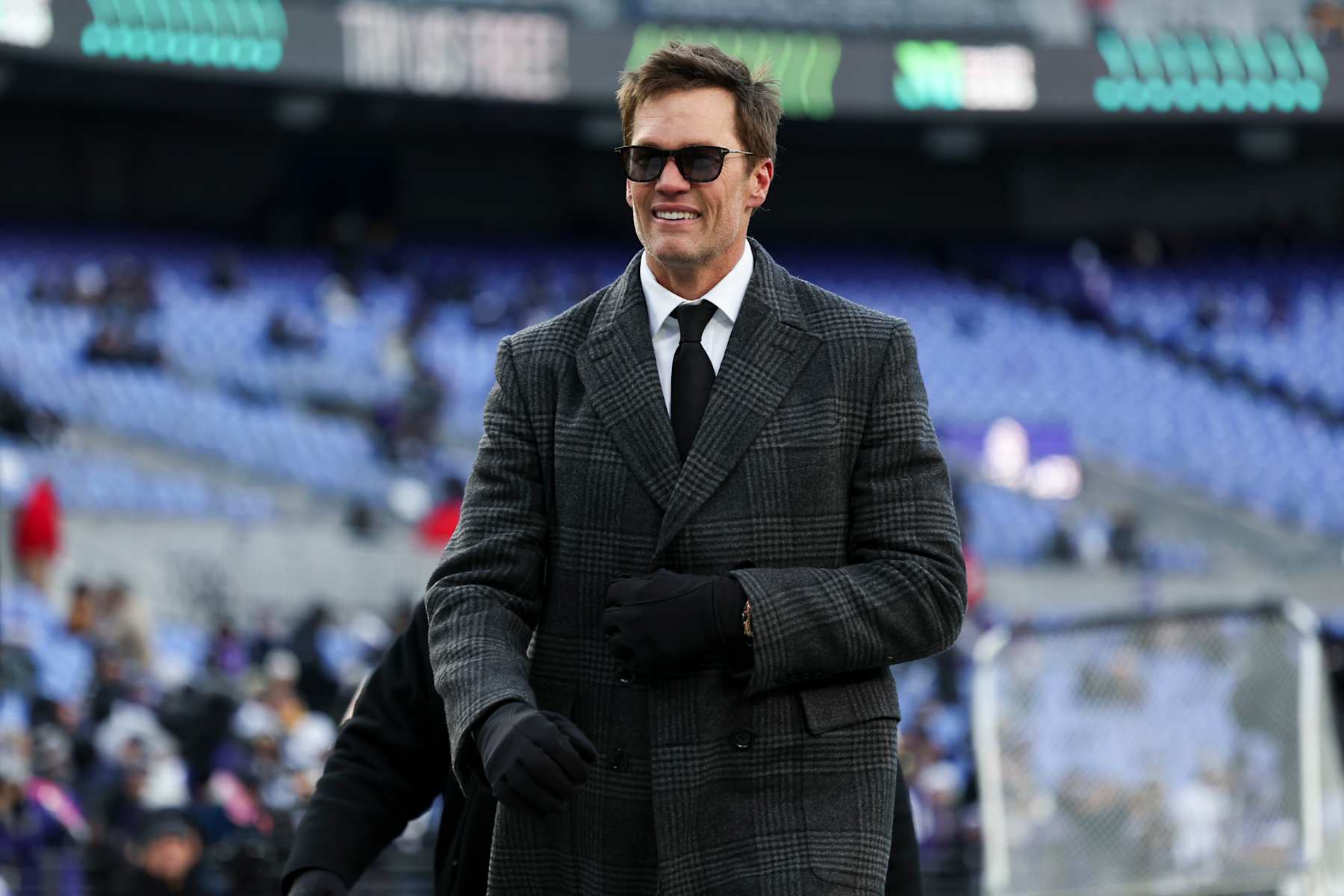 BALTIMORE, MARYLAND - DECEMBER 21: Former NFL quarterback Tom Brady is seen on the field prior to a game between the Pittsburgh Steelers and the Baltimore Ravens at M&T Bank Stadium on December 21, 2024 in Baltimore, Maryland. The Ravens defeated the Steelers 34-17. (Kara Durrette/Getty Images)
