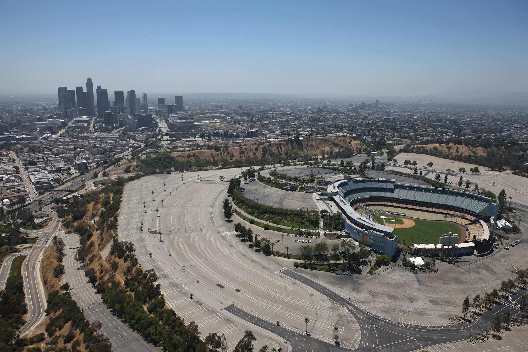 LOS ANGELES, CA - JULY 13: An aerial view of Dodger Stadium the home of the Los Angeles Dodgers with the city skyline in the background on July 13, 2010 in Los Angeles, California. (Photo by Tom Szczerbowski/Getty Images)