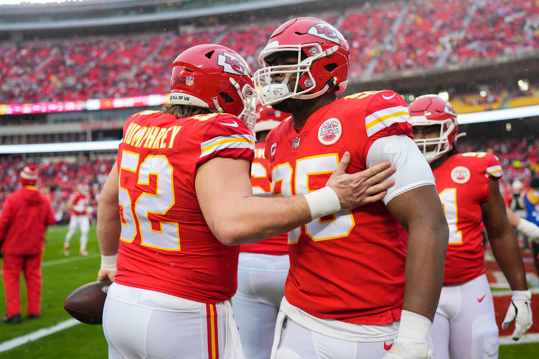KANSAS CITY, MO - JANUARY 21: Creed Humphrey #52 of the Kansas City Chiefs speaks with Chris Jones #95 against the Jacksonville Jaguars at GEHA Field at Arrowhead Stadium on January 21, 2023 in Kansas City, Missouri. (Photo by Cooper Neill/Getty Images)
