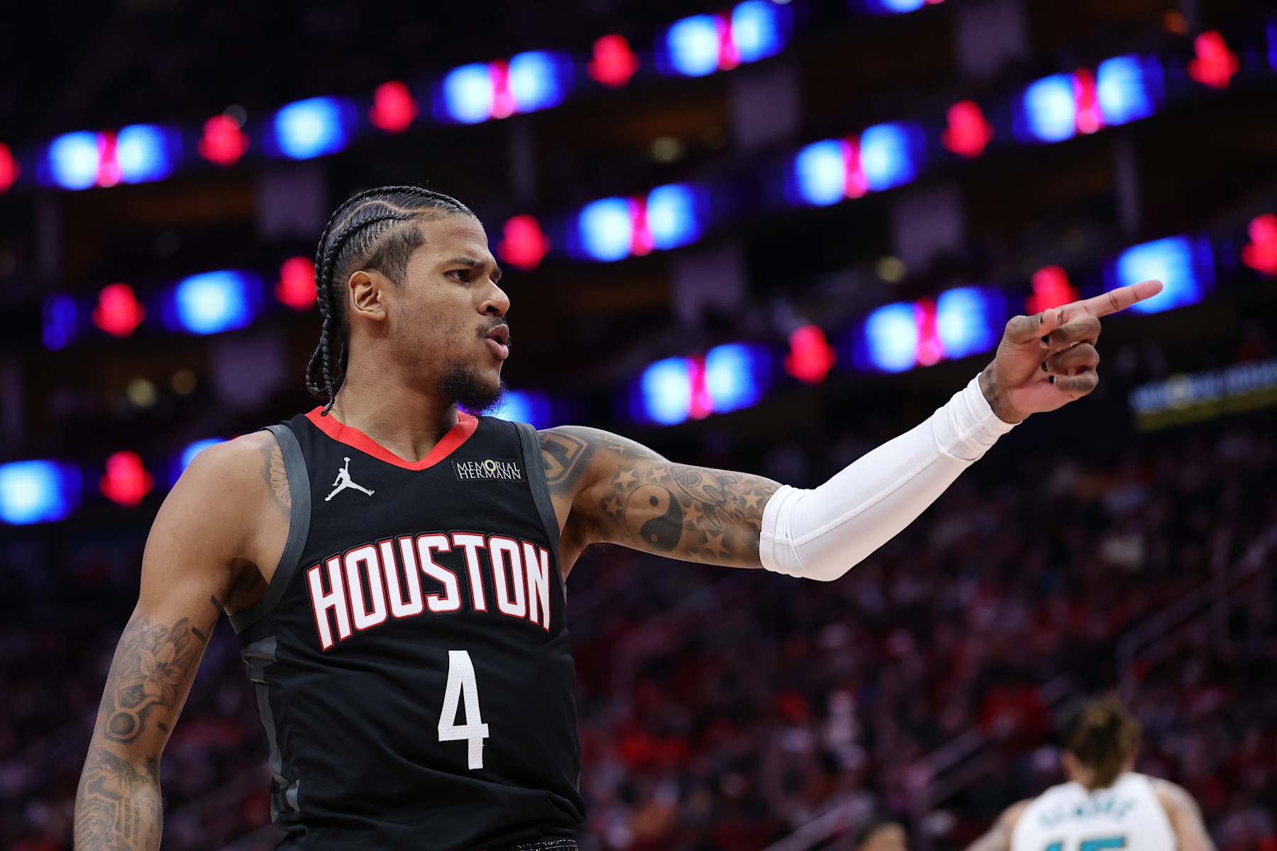 HOUSTON, TEXAS - JANUARY 13: Jalen Green #4 of the Houston Rockets reacts after a basket against the Memphis Grizzlies during the first half at Toyota Center on January 13, 2025 in Houston, Texas. NOTE TO USER: User expressly acknowledges and agrees that, by downloading and or using this photograph, User is consenting to the terms and conditions of the Getty Images License Agreement. (Photo by Alex Slitz/Getty Images)