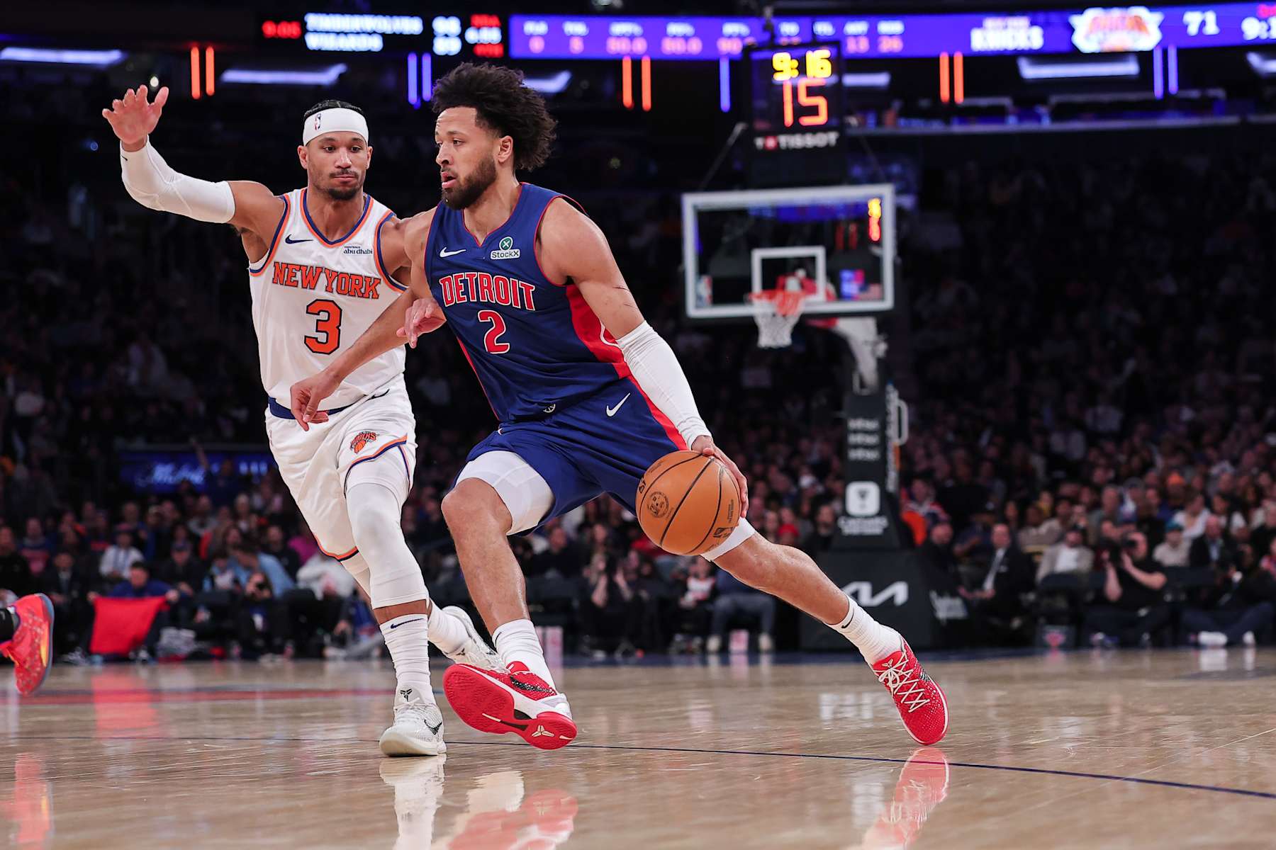 NEW YORK, NEW YORK - JANUARY 13: Cade Cunningham #2 of the Detroit Pistons is defended by Josh Hart #3 of the New York Knicks during the third quarter of the game at Madison Square Garden on January 13, 2025 in New York City. NOTE TO USER: User expressly acknowledges and agrees that, by downloading and or using this photograph, User is consenting to the terms and conditions of the Getty Images License Agreement. (Photo by Dustin Satloff/Getty Images)
