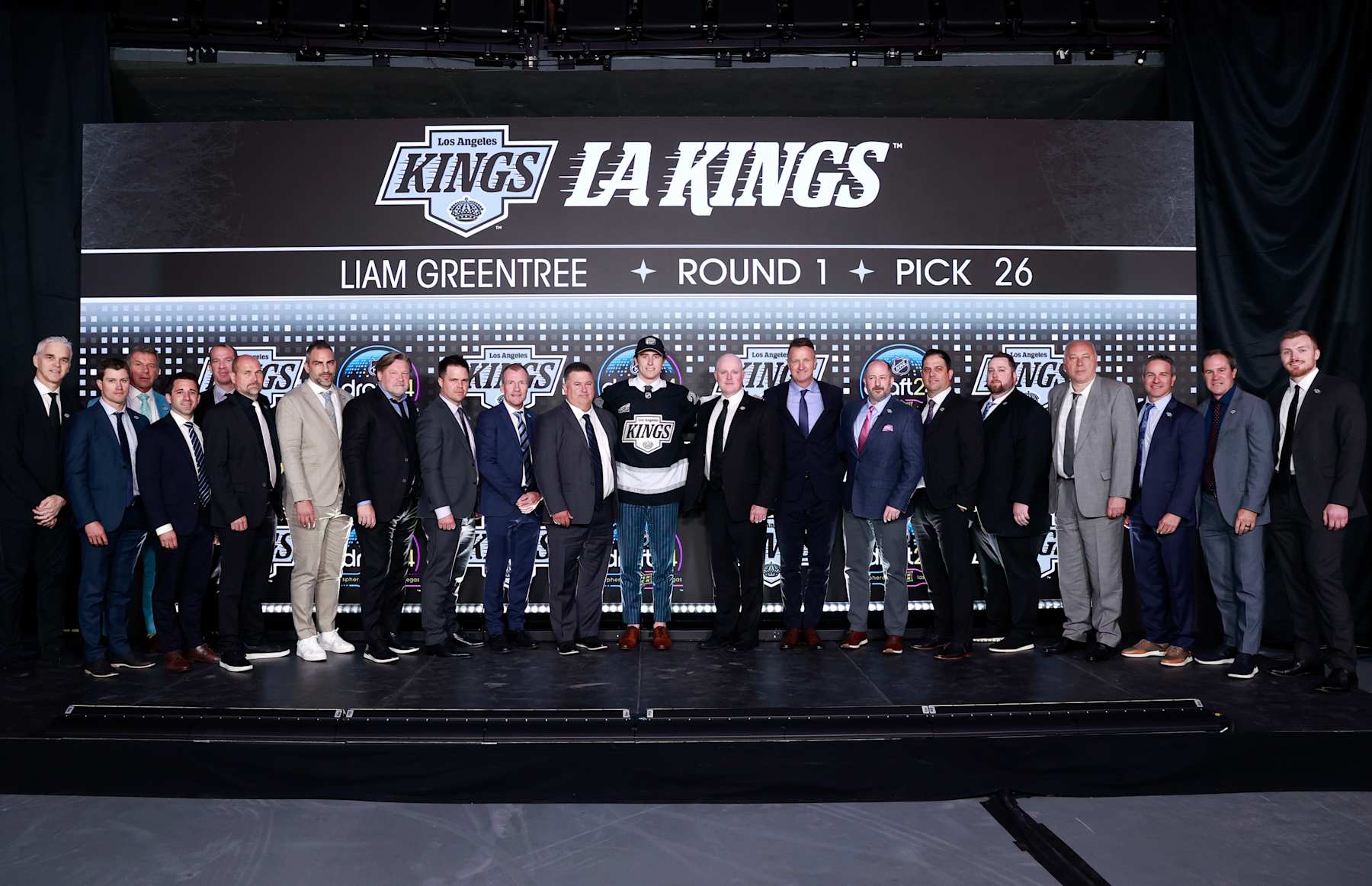 LAS VEGAS, NEVADA - JUNE 28: Liam Greentree poses for a group photo with team personnel after being selected 26th overall by the Los Angeles Kings during the first round of the 2024 Upper Deck NHL Draft at Sphere on June 28, 2024 in Las Vegas, Nevada. (Photo by Jeff Vinnick/NHLI via Getty Images)