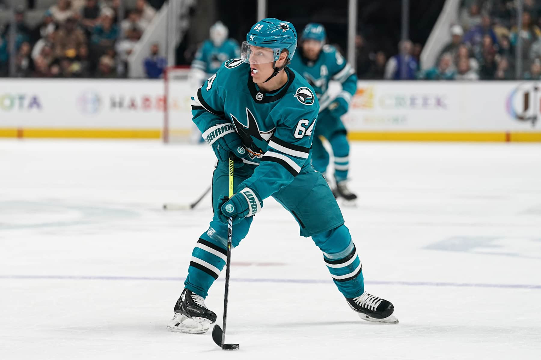 SAN JOSE, CA - JANUARY 11: Mikael Granlund #64 of the San Jose Sharks skates with the puck in the first period against the Minnesota Wild at SAP Center on January 11, 2025 in San Jose, California. (Photo by Kavin Mistry/NHLI via Getty Images)